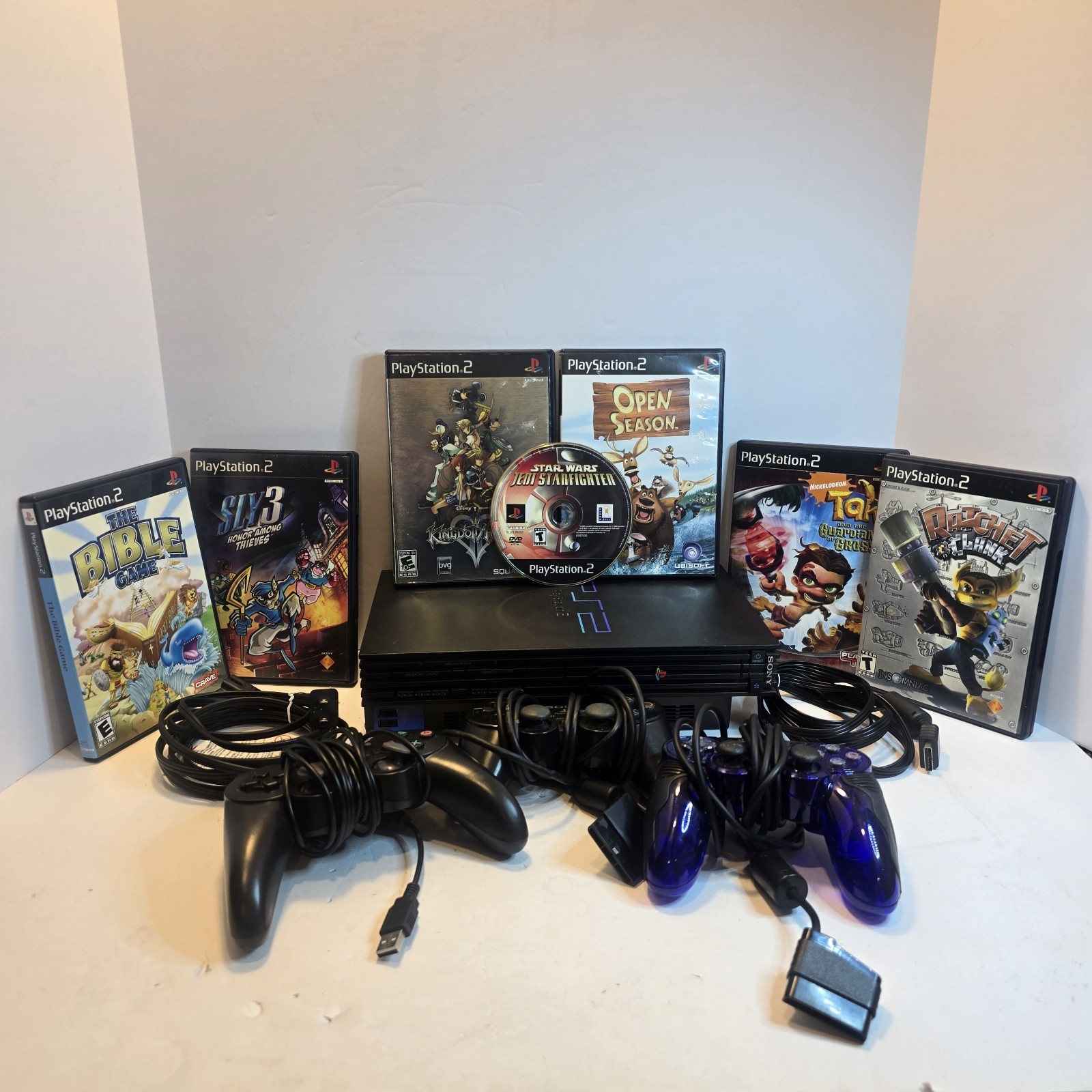 Sony PlayStation 2 Console 7 Games 3 Controllers (2 Off Brand)