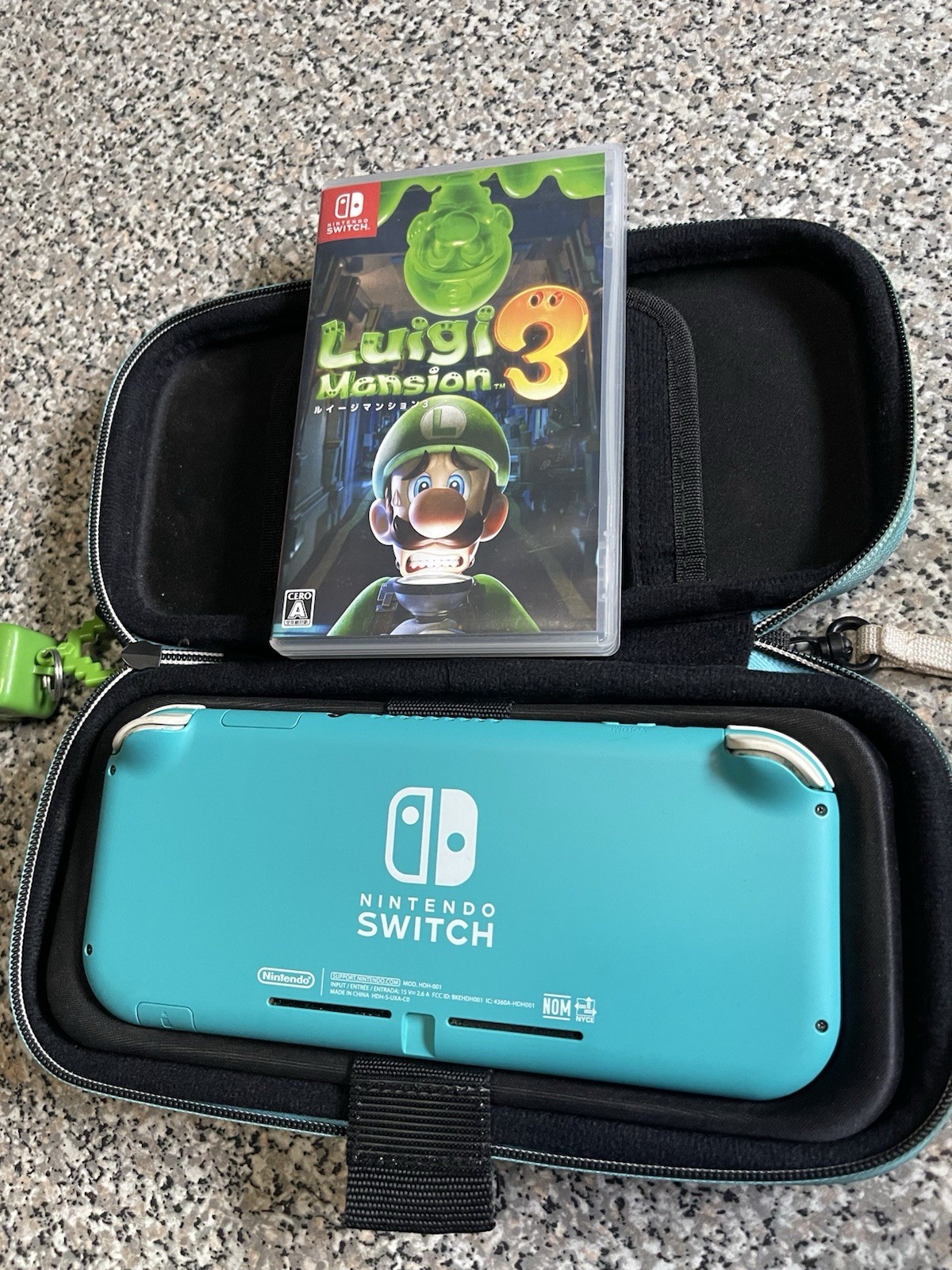 Nintendo Switch Lite Turquoise + Luigi Mansión 3 Game