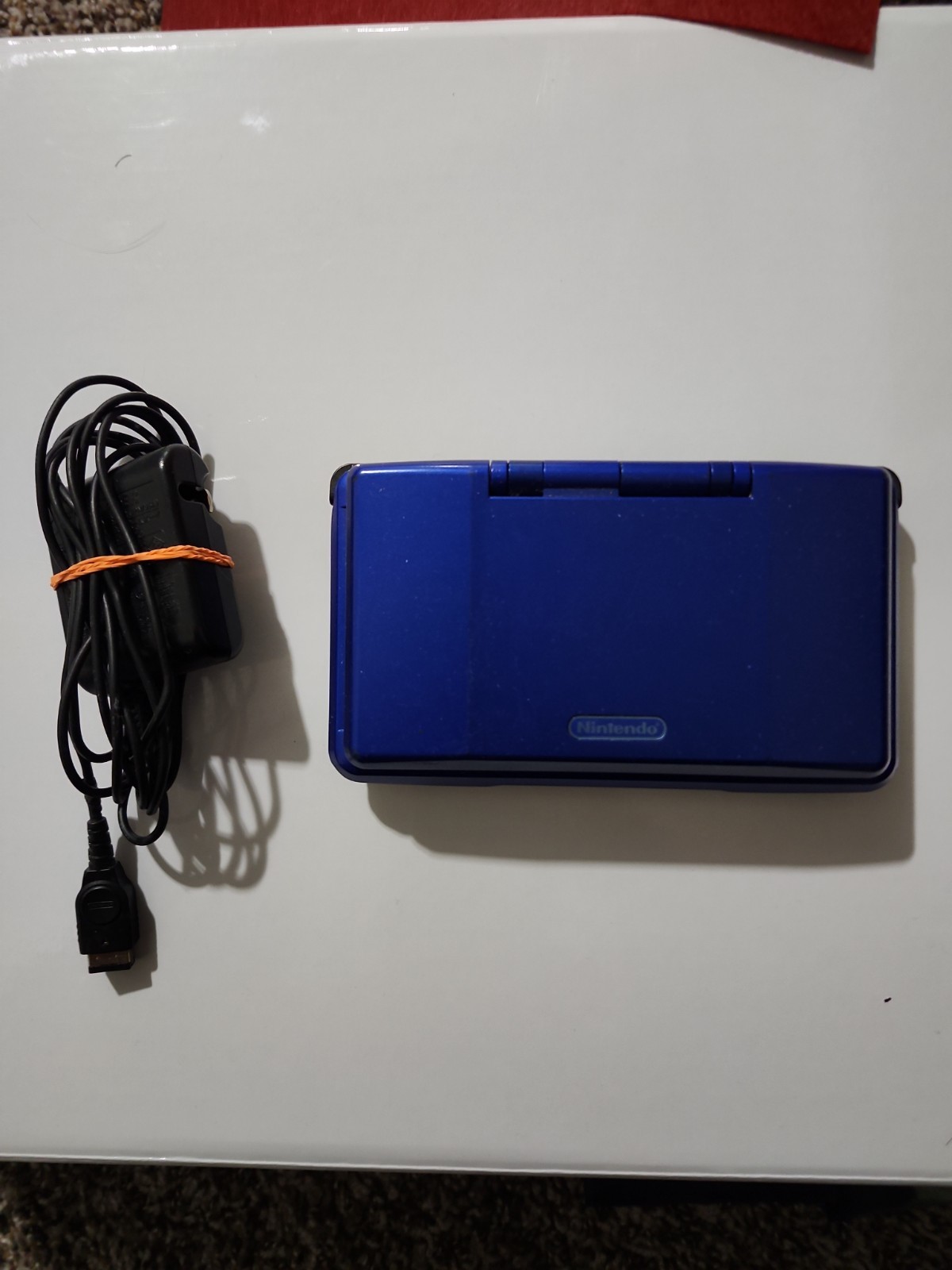 Nintendo DS Launch Edition Electric Blue Handheld System + Charger + Stylus
