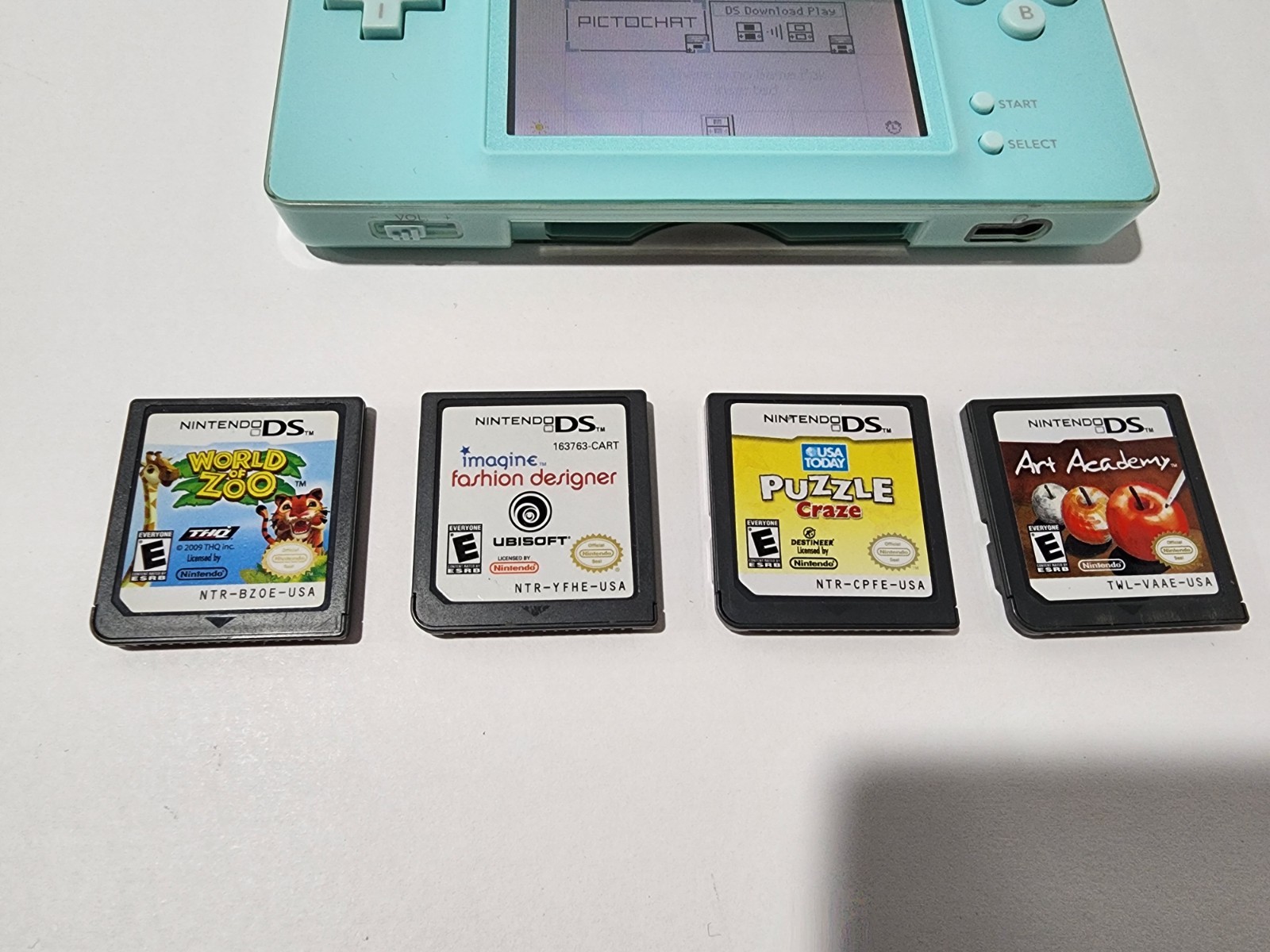 Nintendo DS Lite Handheld Console – Ice Blue with 4 Games