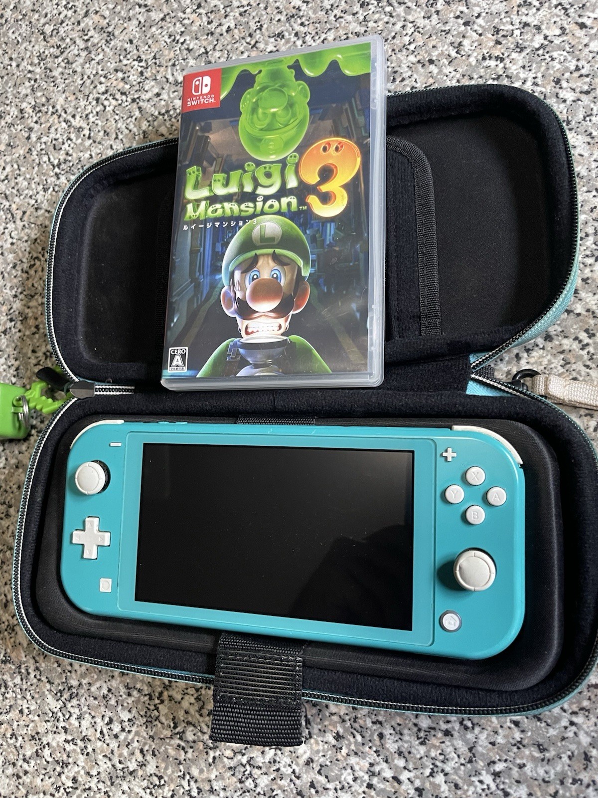 Nintendo Switch Lite Turquoise + Luigi Mansión 3 Game