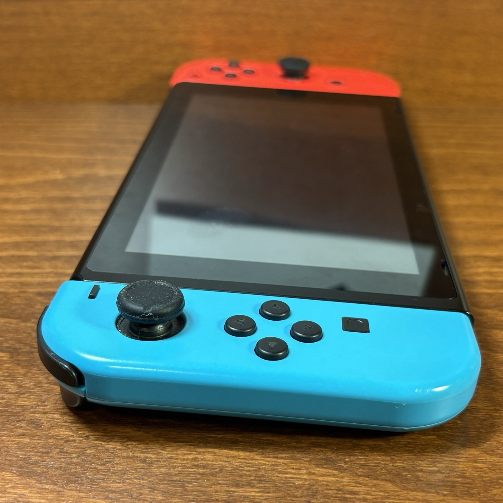 Nintendo Switch with Neon Blue & Neon Red Joy-Con | Works Perfectly | Case Inclu