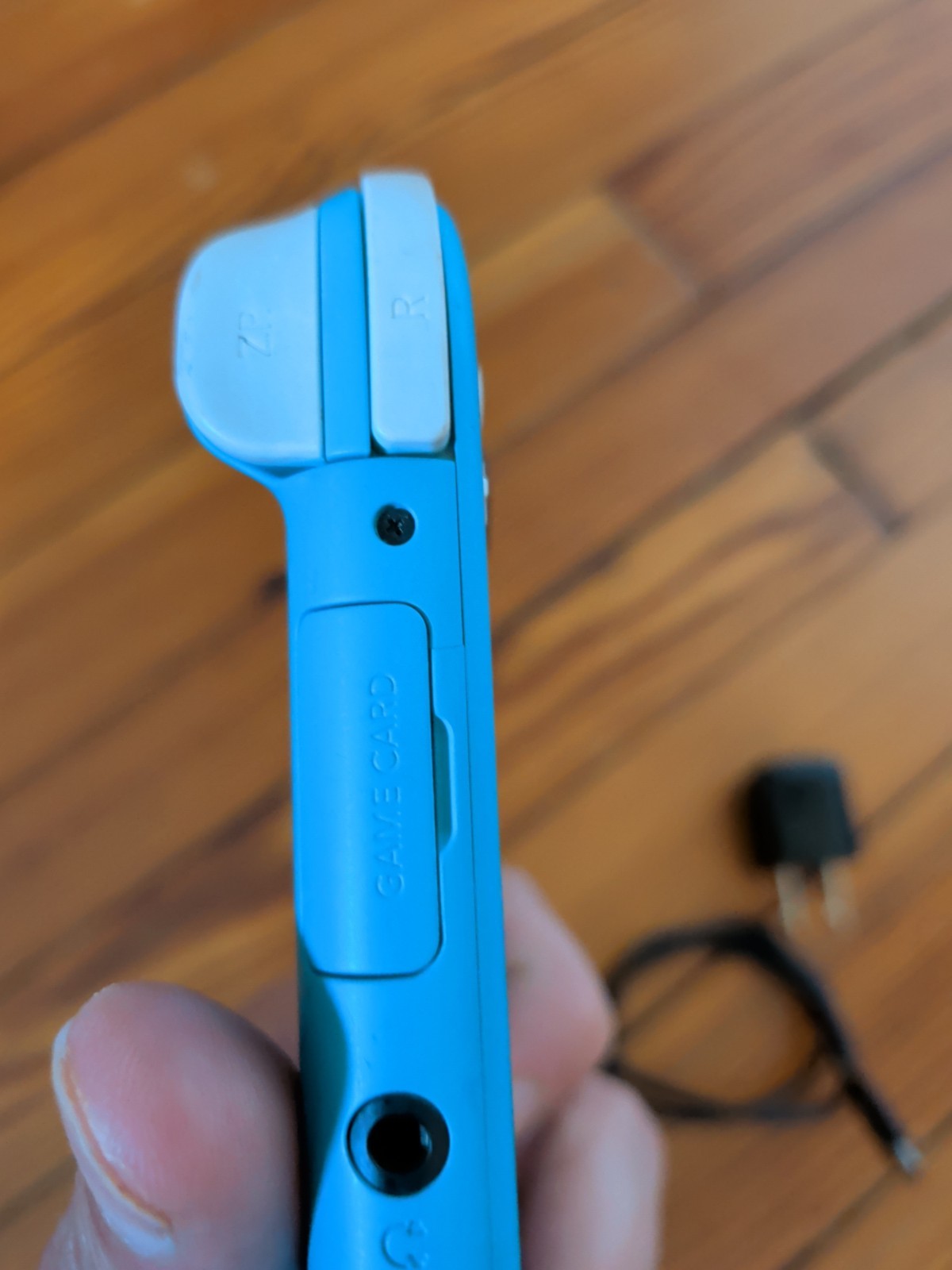 Nintendo Switch Lite Turquoise 32GB Console; Charger & Mario Odyssey Game – Fair