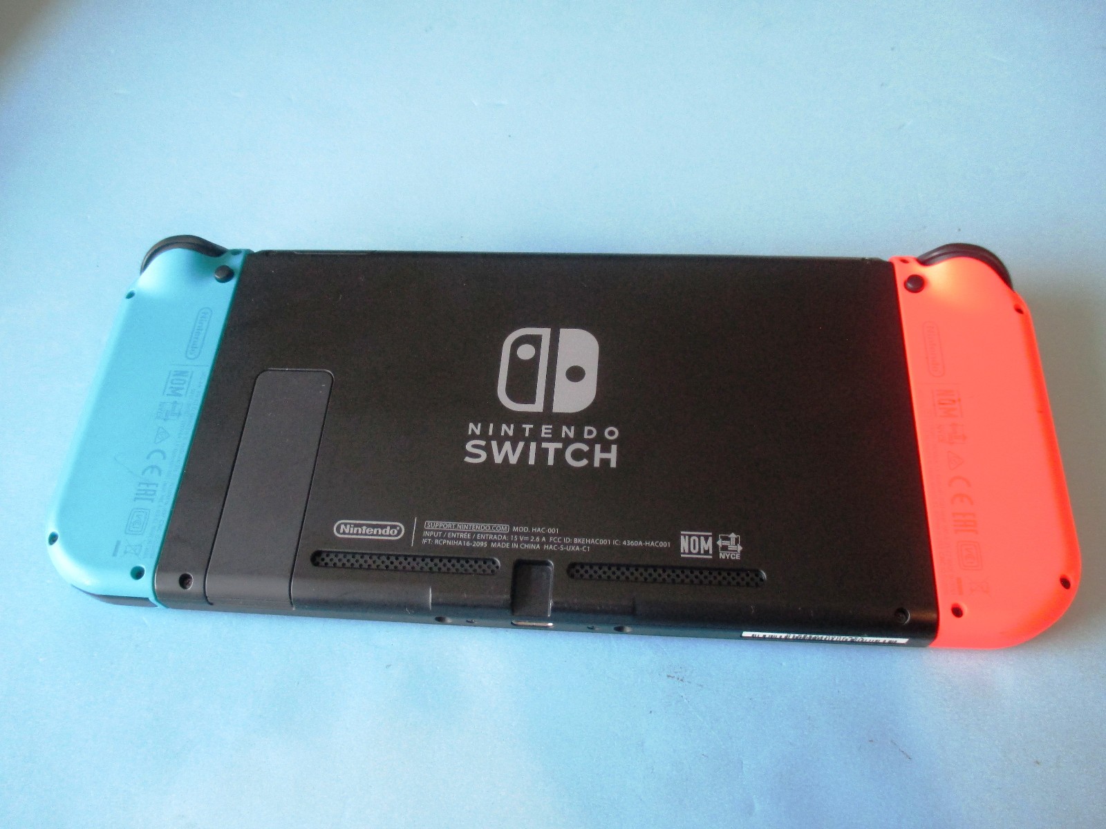 Nintendo Switch System Console w/Neon Red & Blue Joy-Cons + Case & Charger