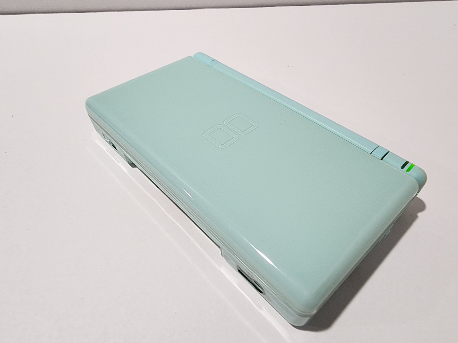 Nintendo DS Lite Handheld Console – Ice Blue with 4 Games