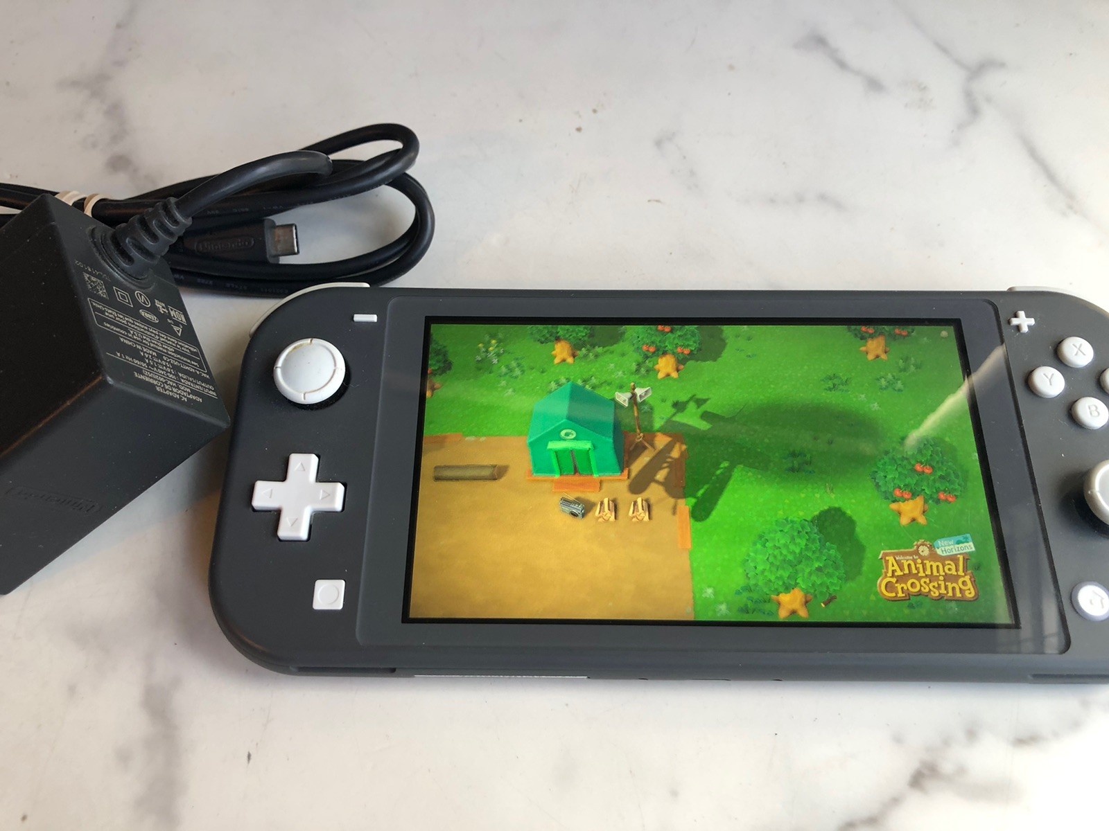 Nintendo Switch Lite Handheld System Gray 32GB Animal Crossing Game Bundle