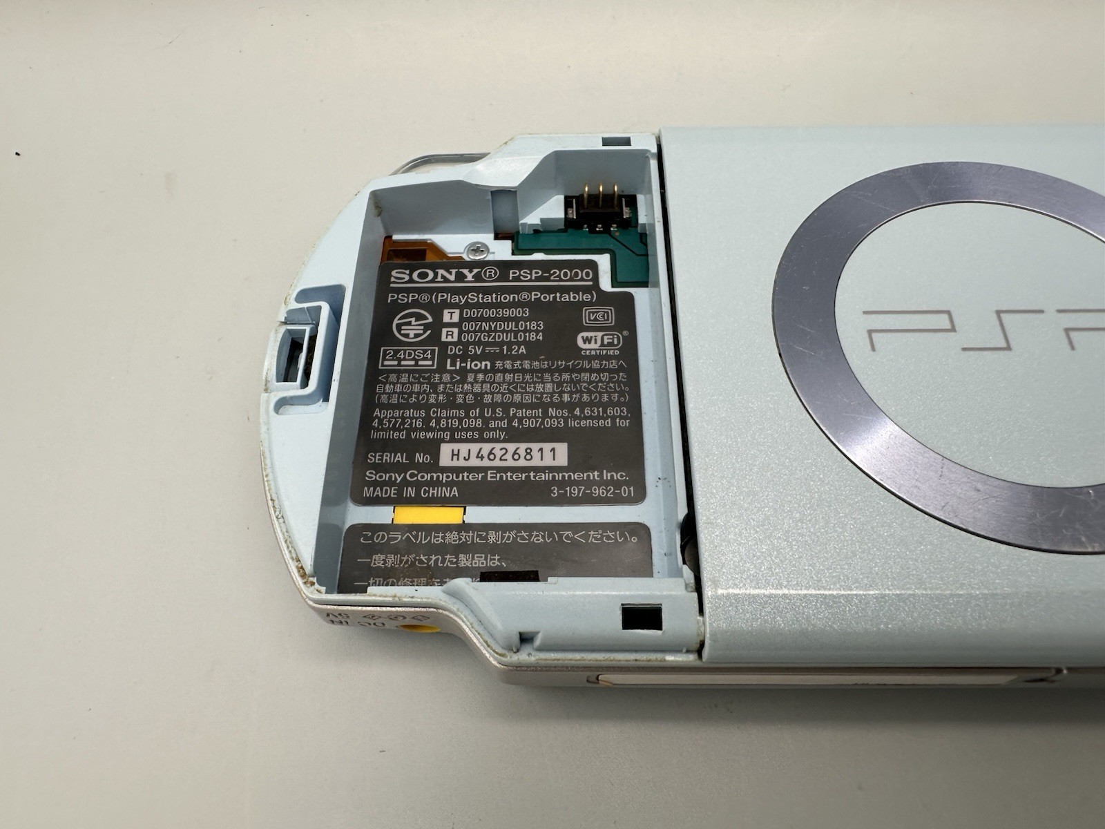 Sony PSP 2000 Console – Felicia Blue + New Battery + 2GB Memory Stick + Charger