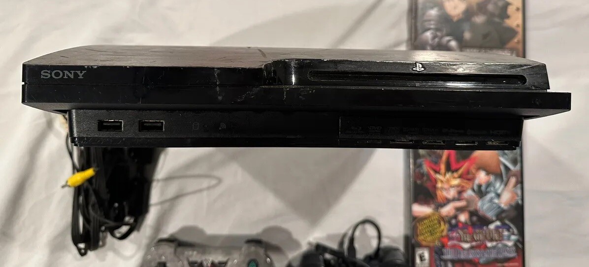 Sony PS3 Slim Console CECH-2001A With Remotes