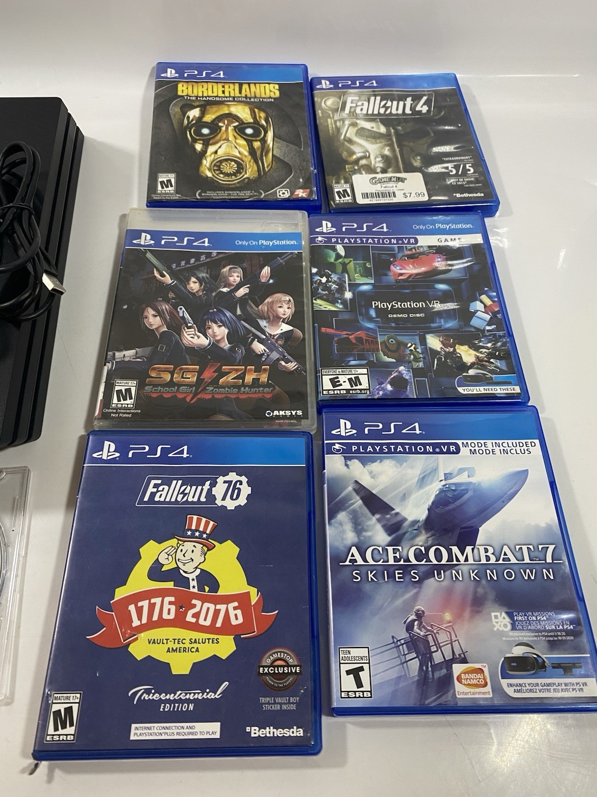Sony PS4 Pro 1TB Console Bundle + Controller + 8 Games