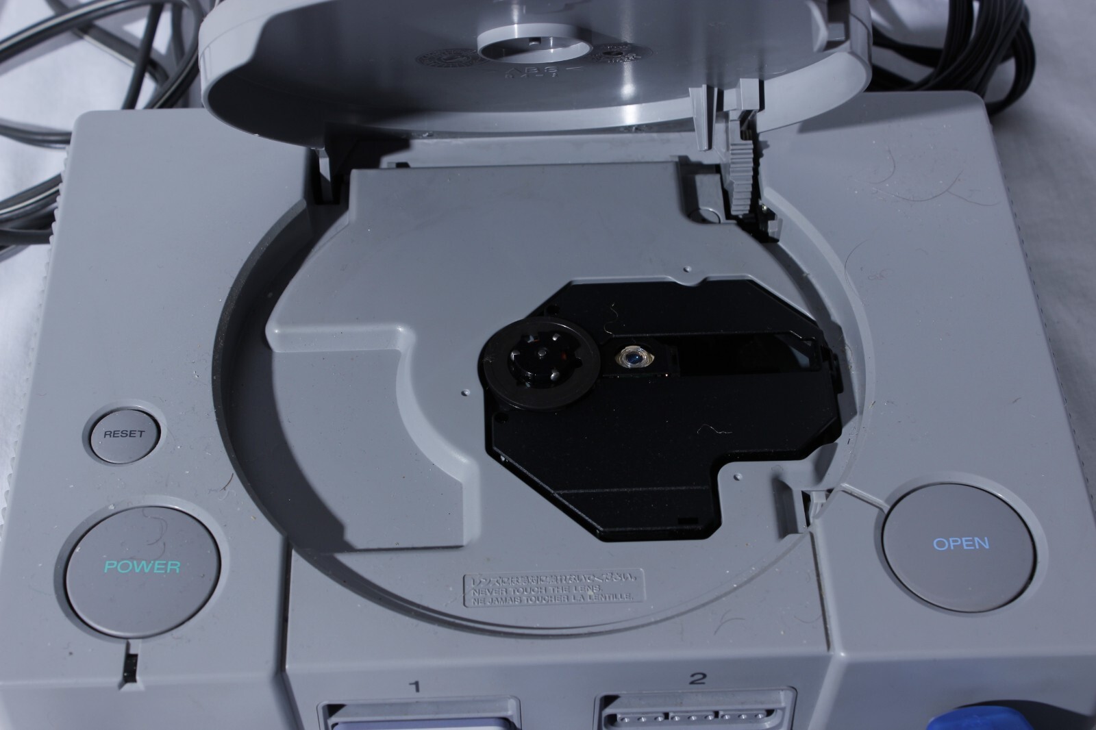 Sony Playstation 1 Gray Console With Blue Sony Controller, A/V Cable, and Power