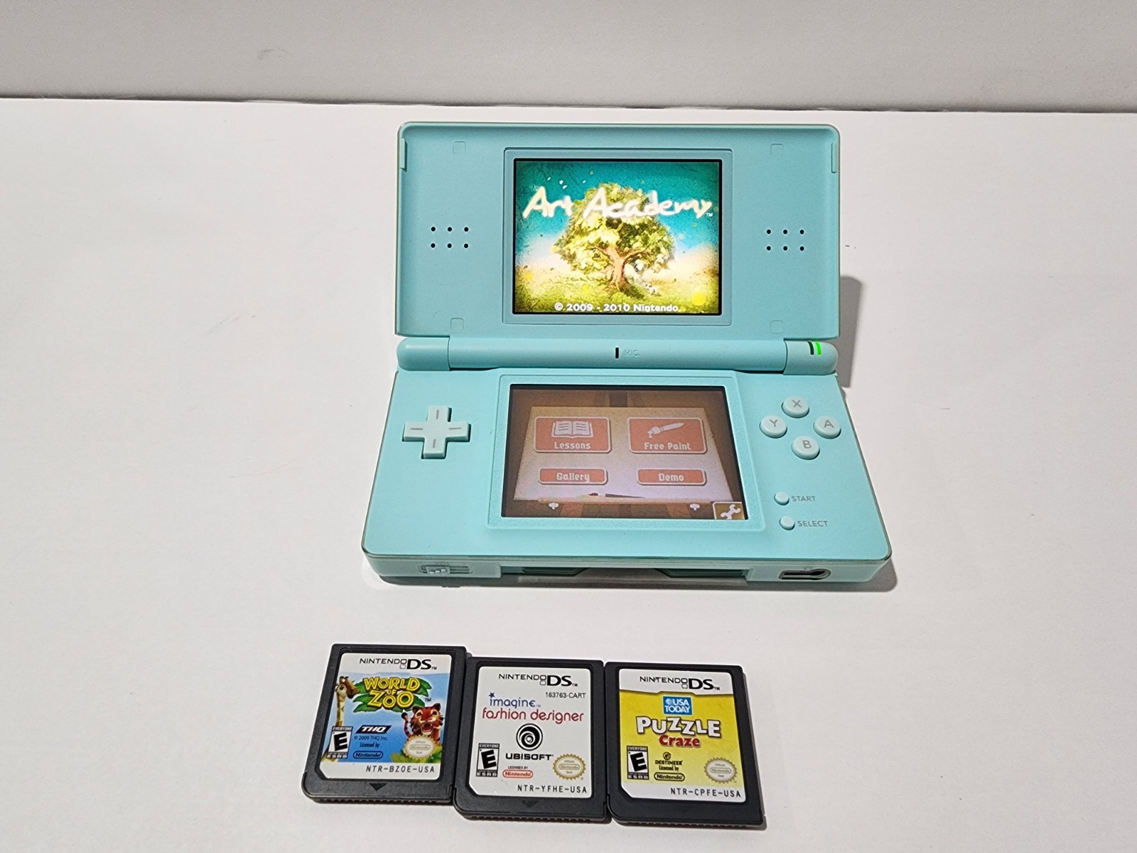 Nintendo DS Lite Handheld Console – Ice Blue with 4 Games