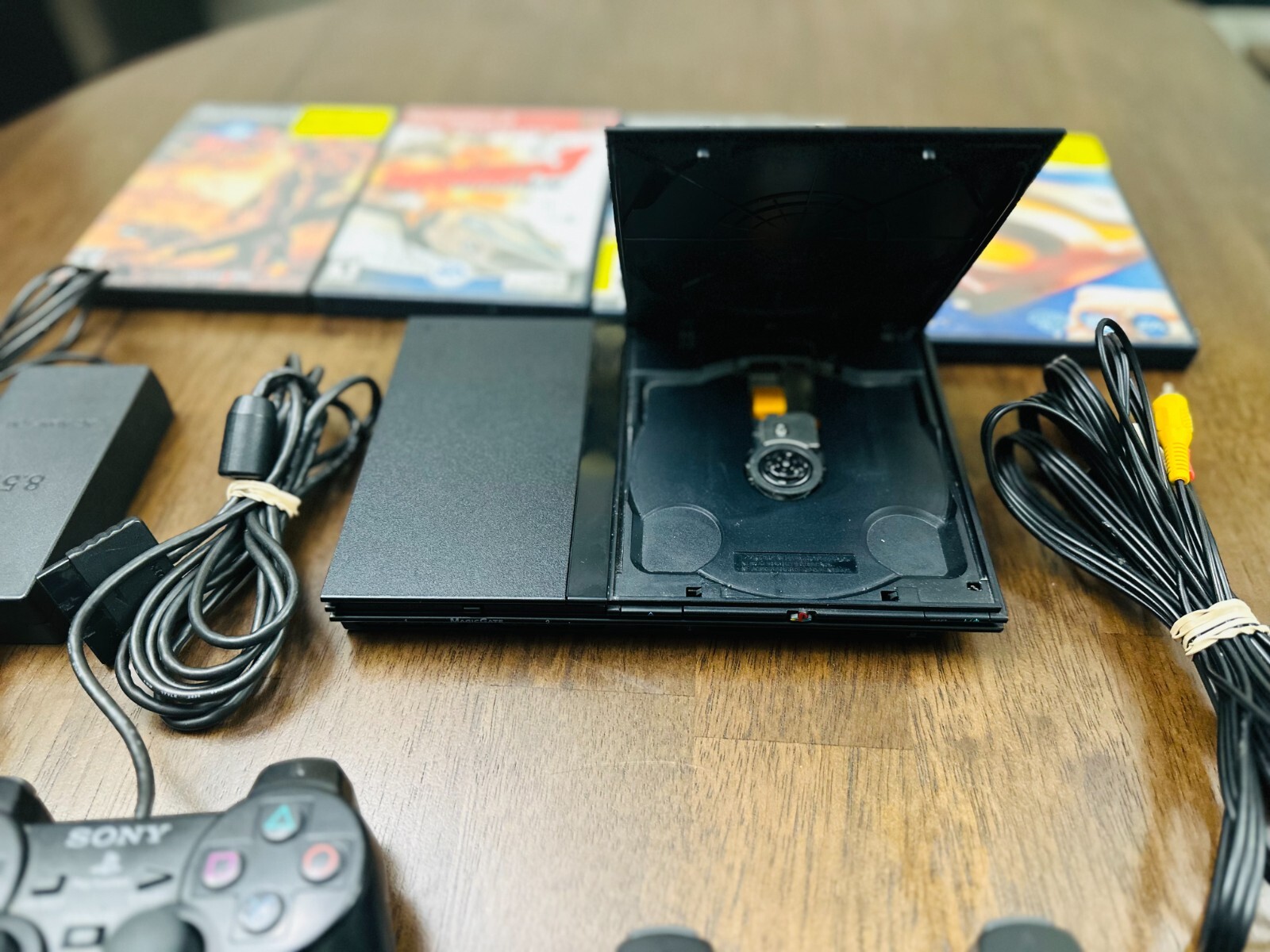 Sony Playstation 2 PS2 Slim Console, 2 controllers, games ac and av adap TESTED!