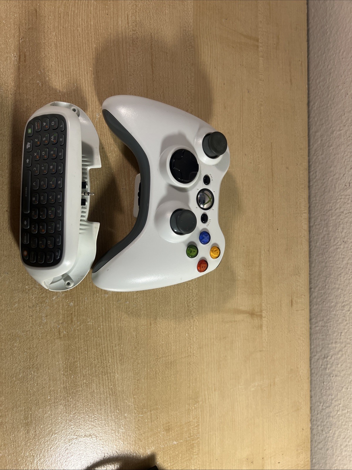 Xbox 360 E 4GB Black With One Wired And Wireless Controller And Charpad