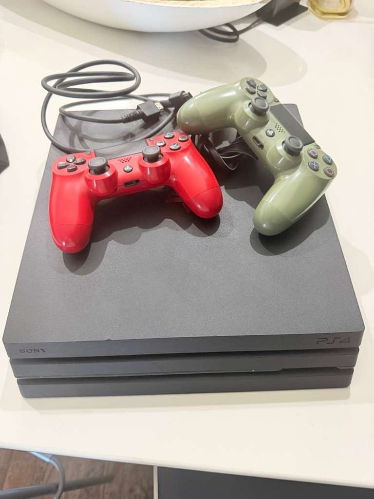 Sony PlayStation 4 Pro Black Console Two Controllers Wi-Fi Internet Browsing