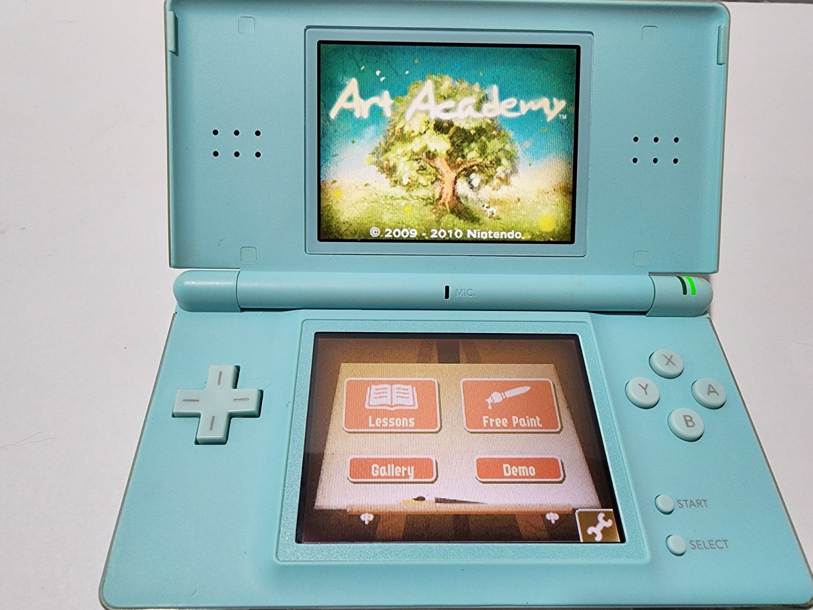 Nintendo DS Lite Handheld Console – Ice Blue with 4 Games