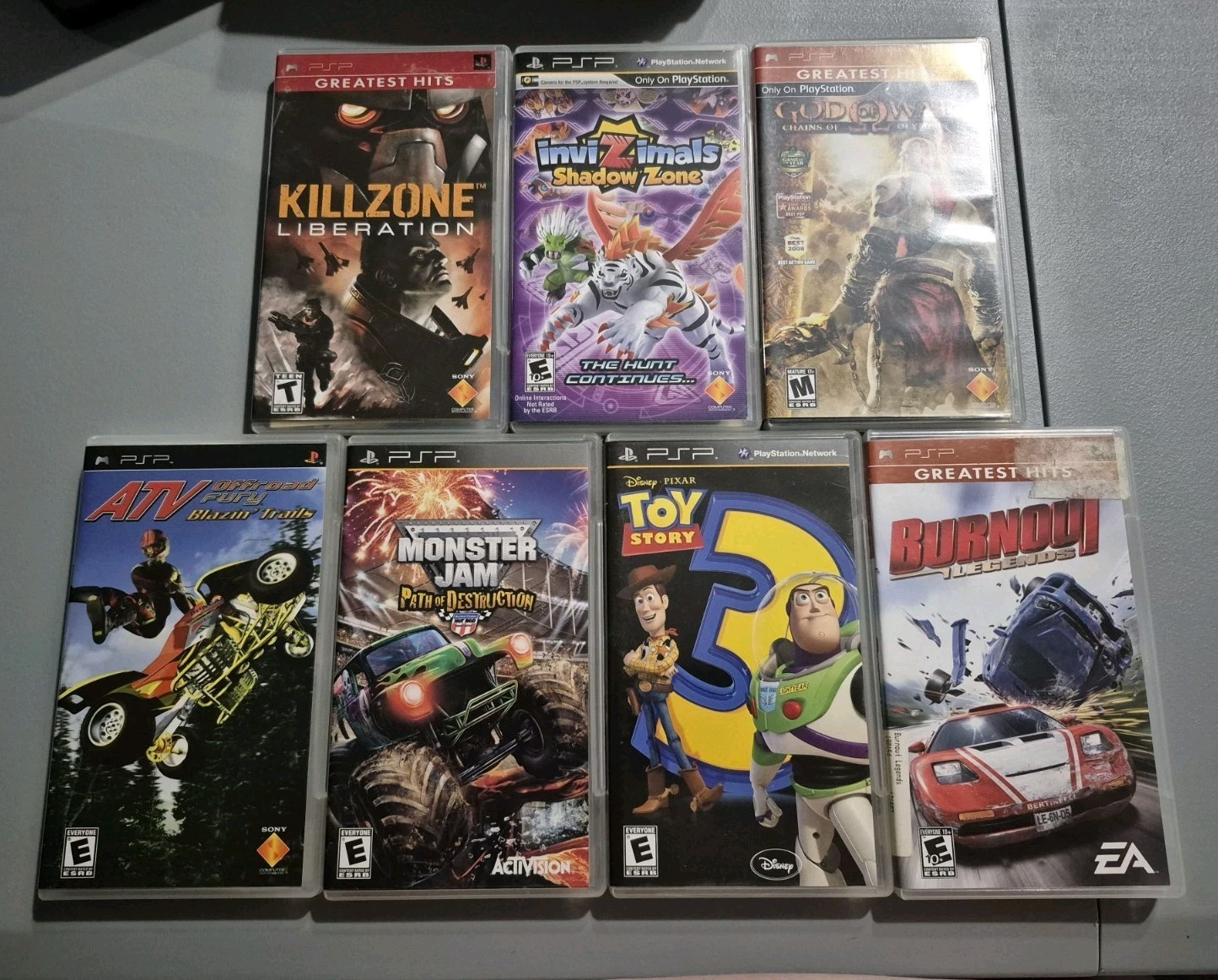 Sony PSP Silver w/ Games and Movies Lot Sale With Box and Accessories TESTED