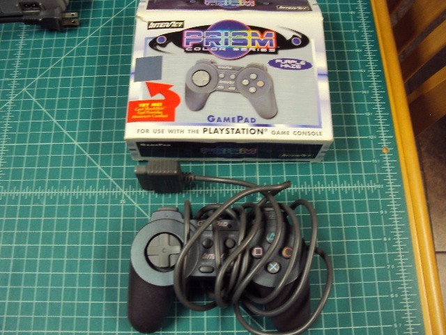 Sony Playstation 1 console bundle with 6 games .