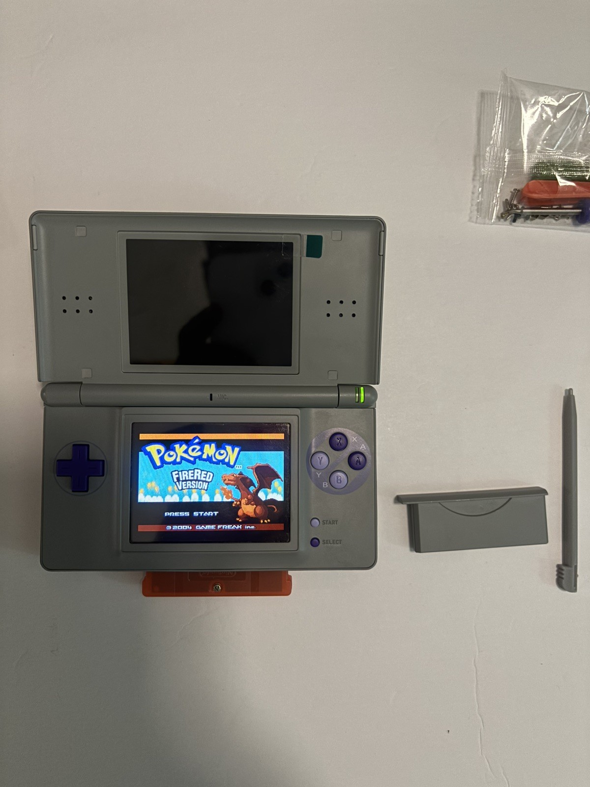 Nintendo ds lite SNES Bundle With Charger, firered and screwdriver/buttons