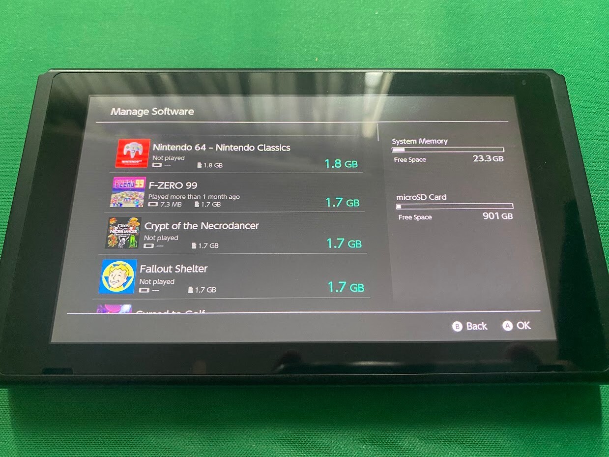 Nintendo Switch 32GB Handheld Console – Neon Red/Neon Blue HAC-001 + 1tb MicroSD