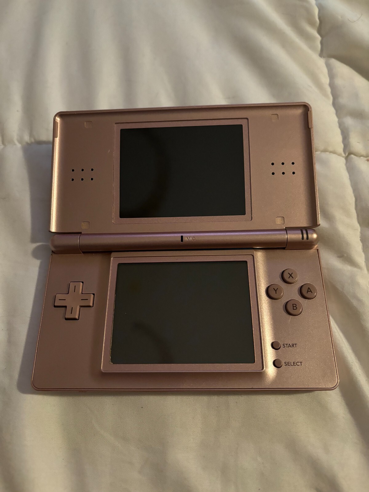 Pink Nintendo DS lite with Charger and Blue carrying case and charger w/ games