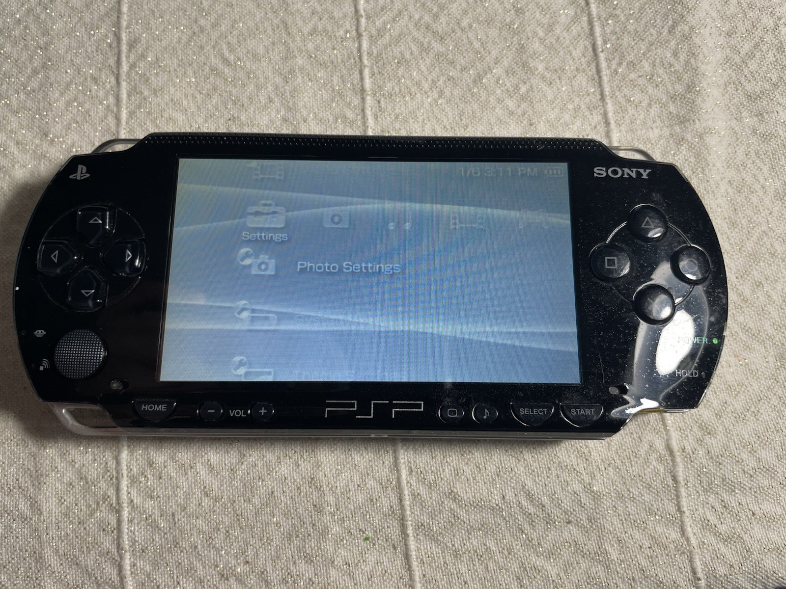 Sony PSP-1001 Black Console w/ 2GB Sony Storage Memory Card, 4 UMDs, Yes Charger