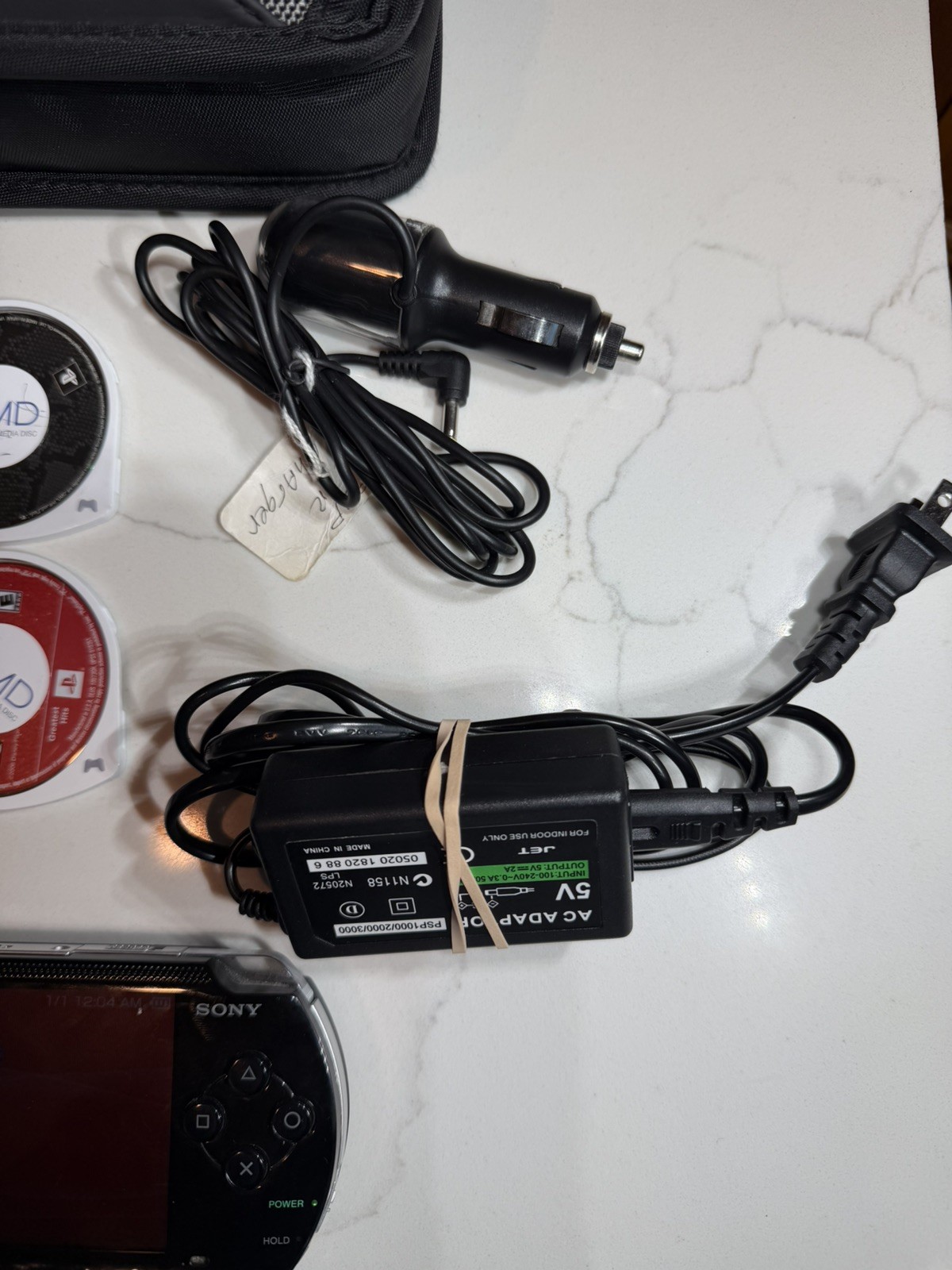 Sony PSP-1001 PlayStation Portable – Black w/ Games + Case + Cables
