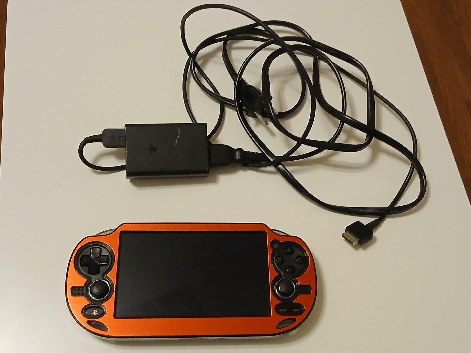 SONY PS Vita PCH-1101 – Pre-Owned, Red Case, 4GB Memory Card + Charger Included