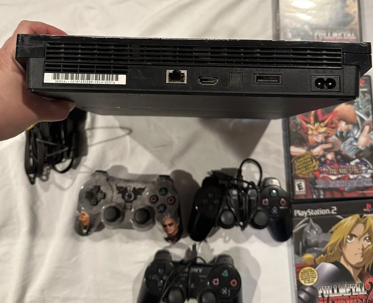 Sony PS3 Slim Console CECH-2001A With Remotes