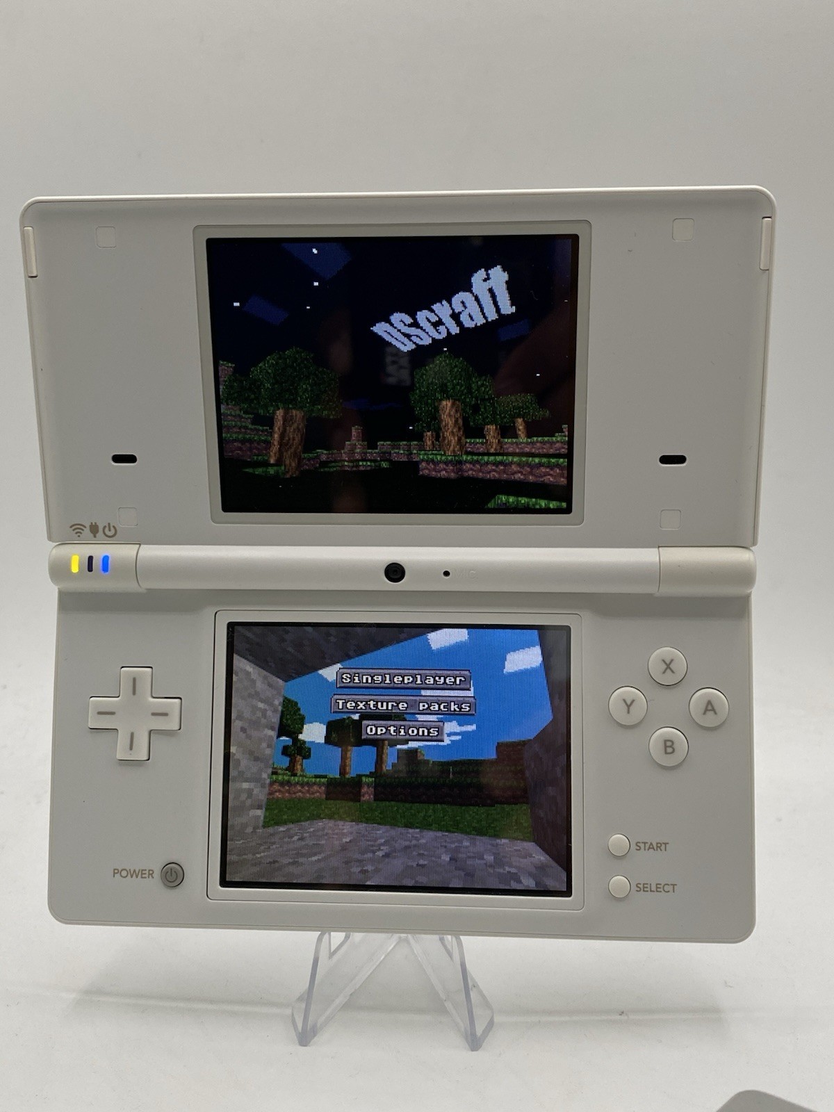 Nintendo DSi White – Includes Preloaded Library (Large Collection)