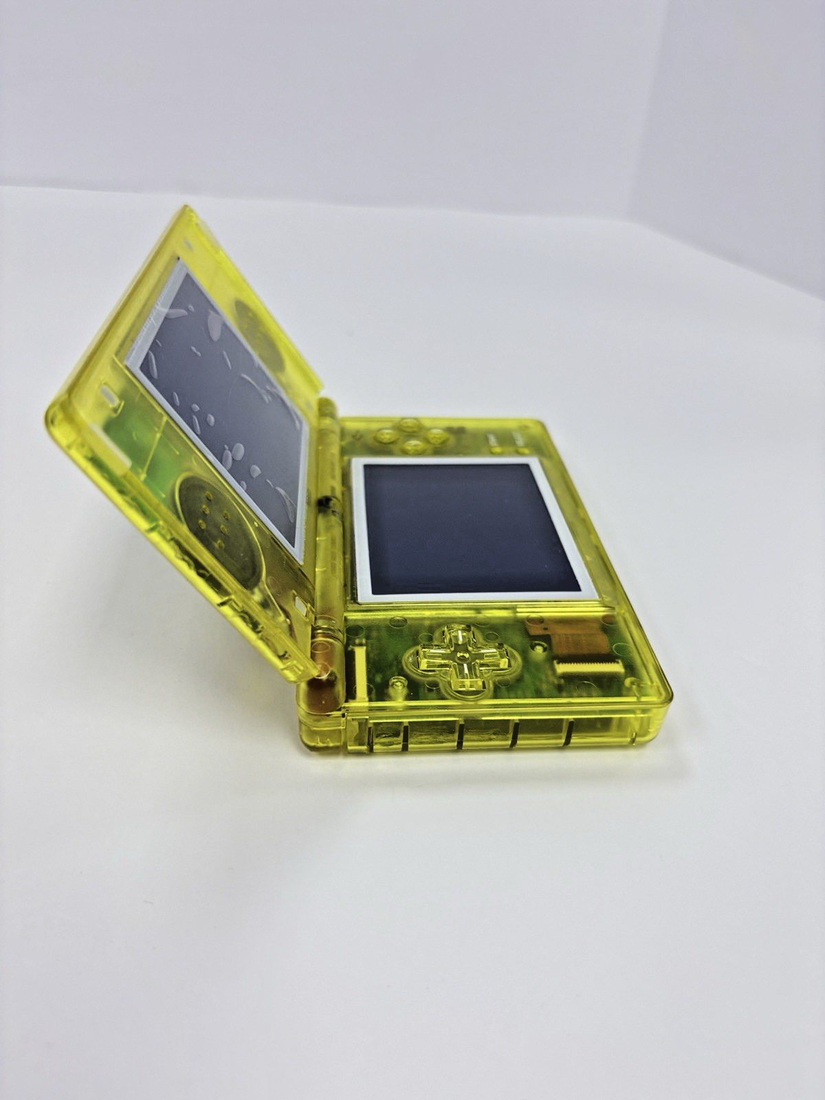 Refurbished Nintendo DS Lite – Transparent Yellow – New Shell