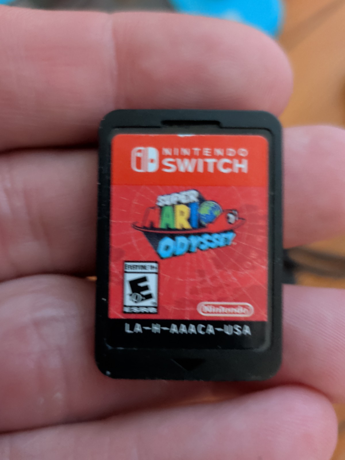 Nintendo Switch Lite Turquoise 32GB Console; Charger & Mario Odyssey Game – Fair