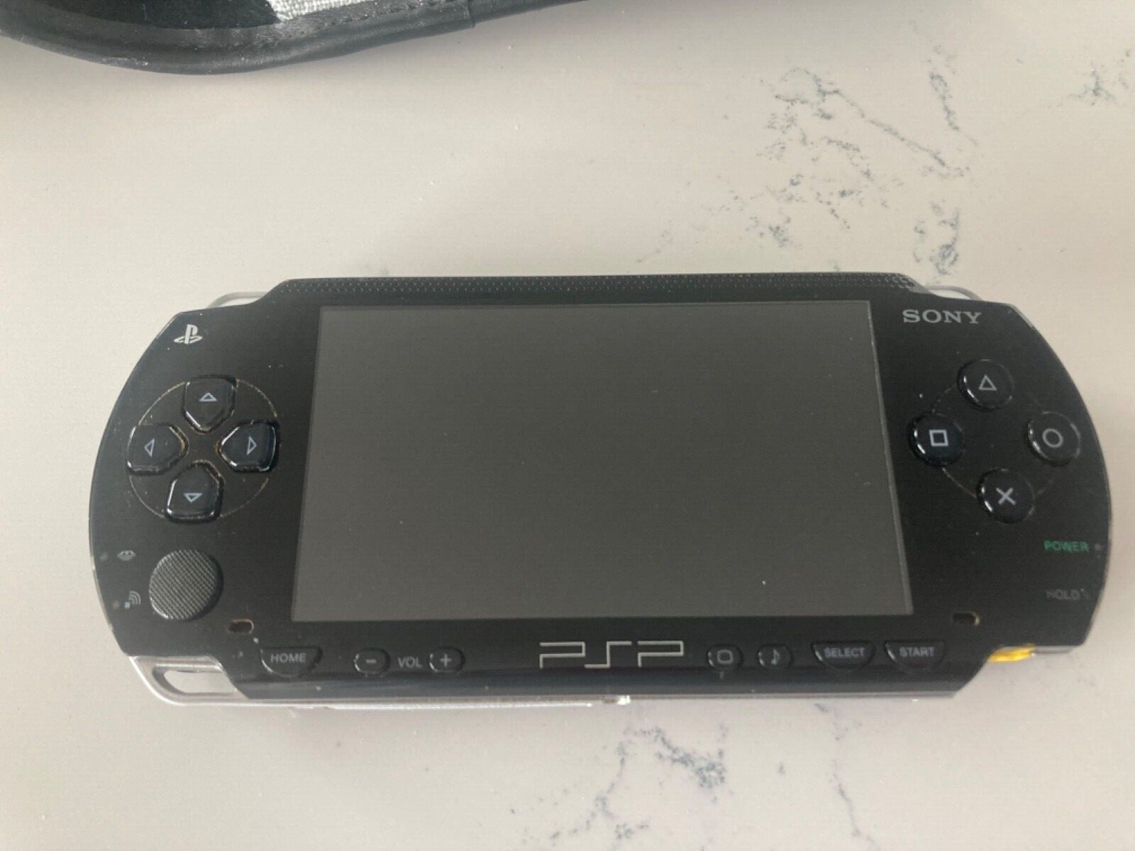 PSP complete with 10 games carrying case and power cord