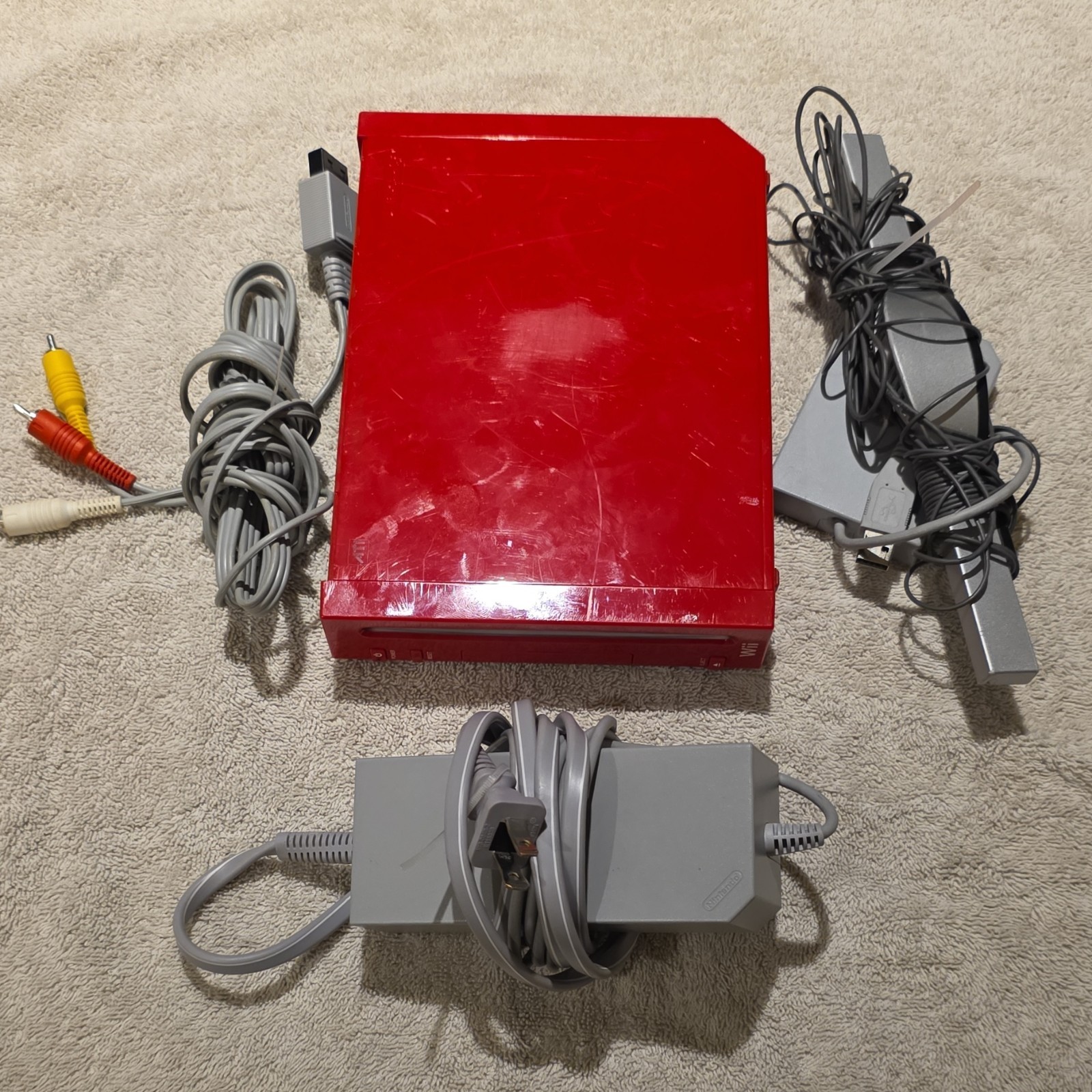 Nintendo Wii Red Console with Wii Remote, Sensor Bar, Power Supply, AV Cables