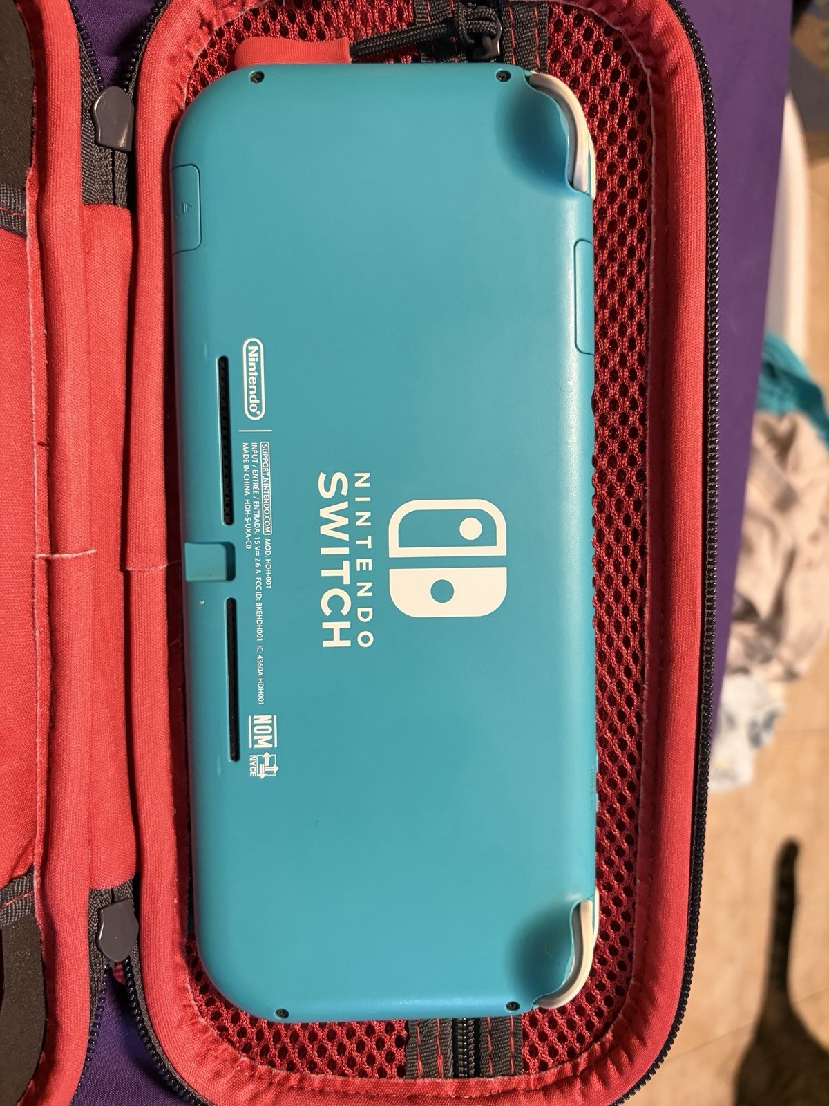 Nintendo Switch Lite 32GB Console – Turquoise With SD Card And Carry Case