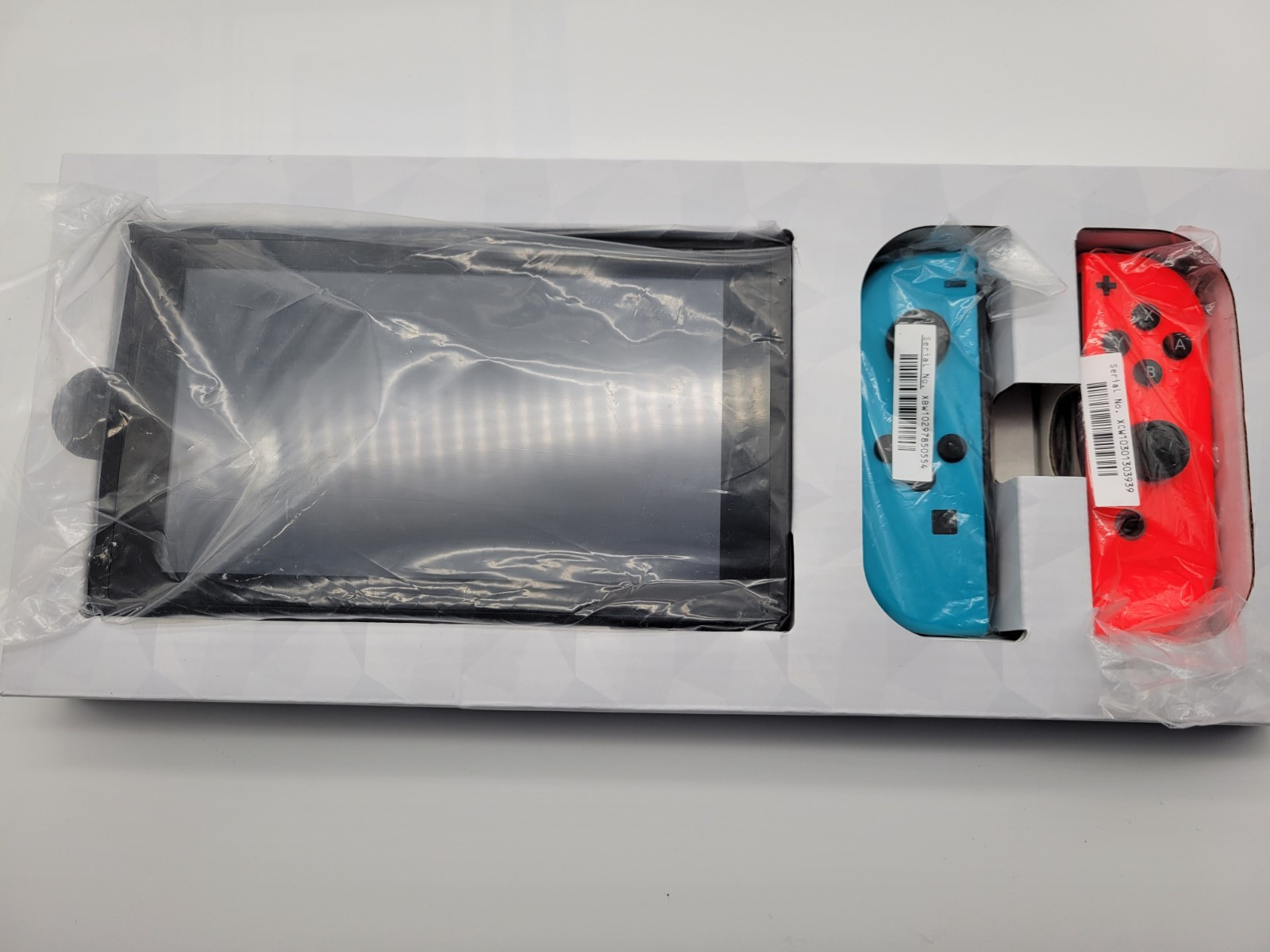 Nintendo Switch Console Neon Red/Neon Blue + Ring Fit Adventure (UK Region Free)