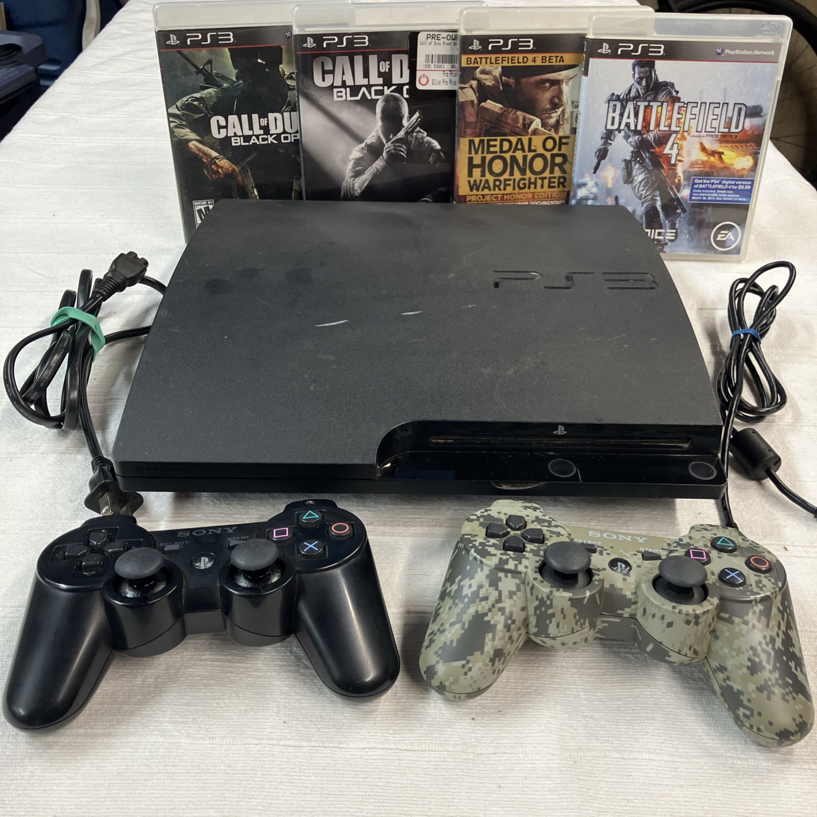 Sony PlayStation 3 PS3 Slim 160GB Console CECH-3001A Bundle with 4 Games Tested