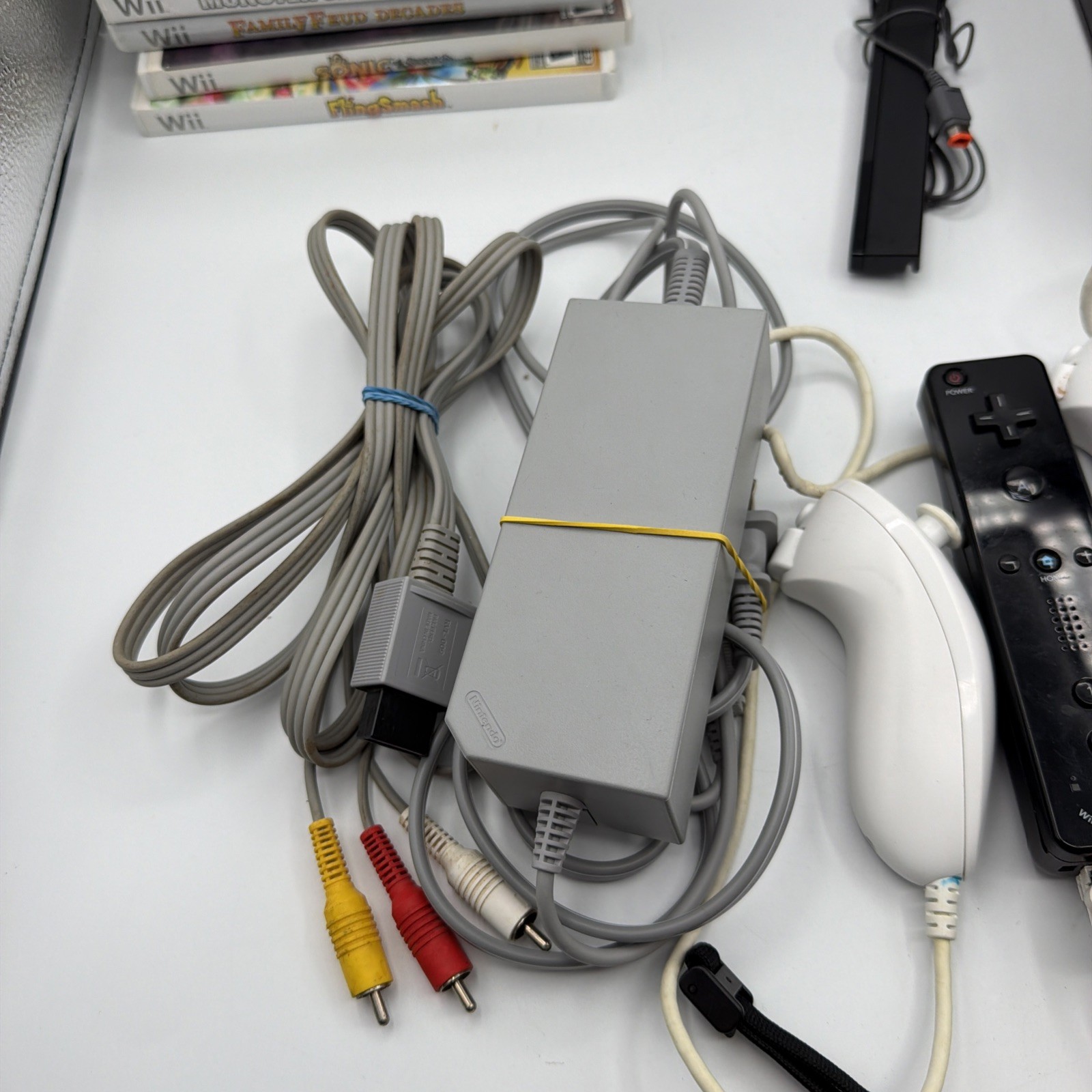 Nintendo Wii RVL-001 Console Bundle 2 Controllers 2 Nunchucks 16 Games Tested