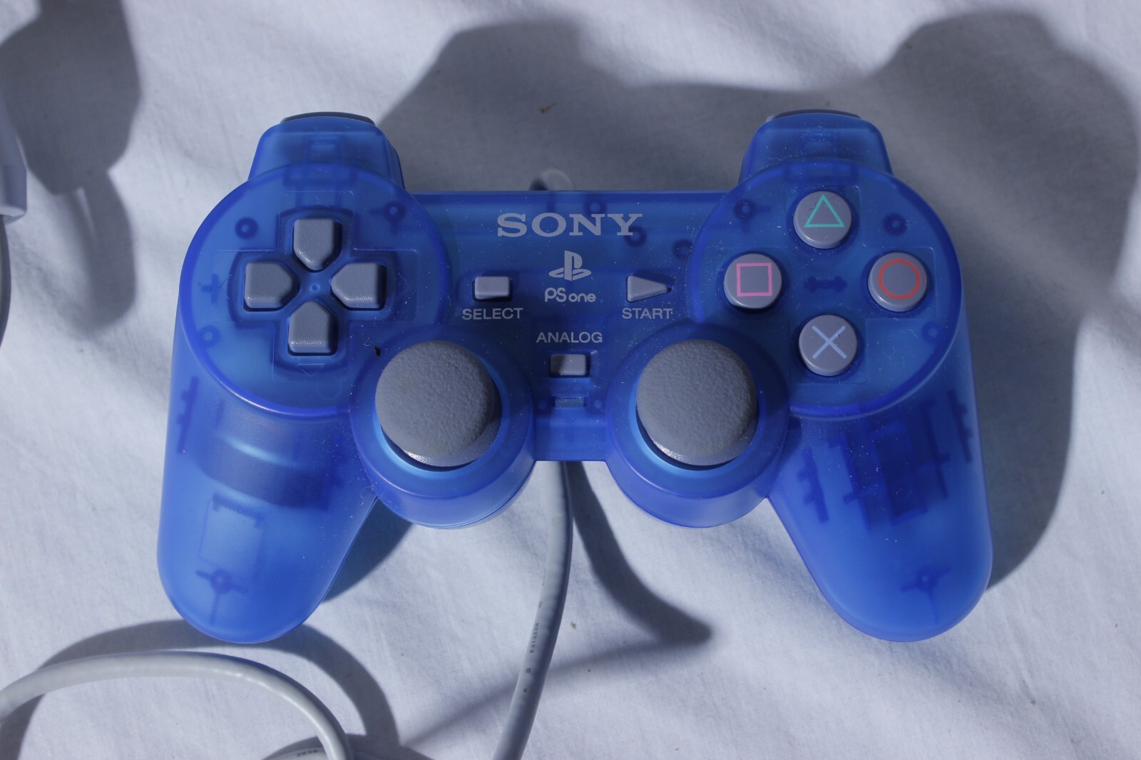 Sony Playstation 1 Gray Console With Blue Sony Controller, A/V Cable, and Power