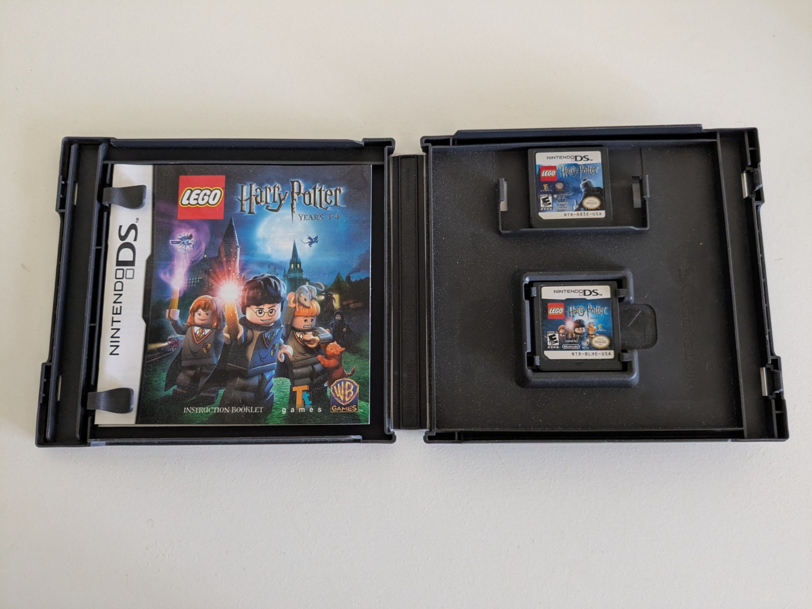 Nintendo DS Lite Black, with Charger (NO stylus) + Lot Of 28 Games – Used, Good