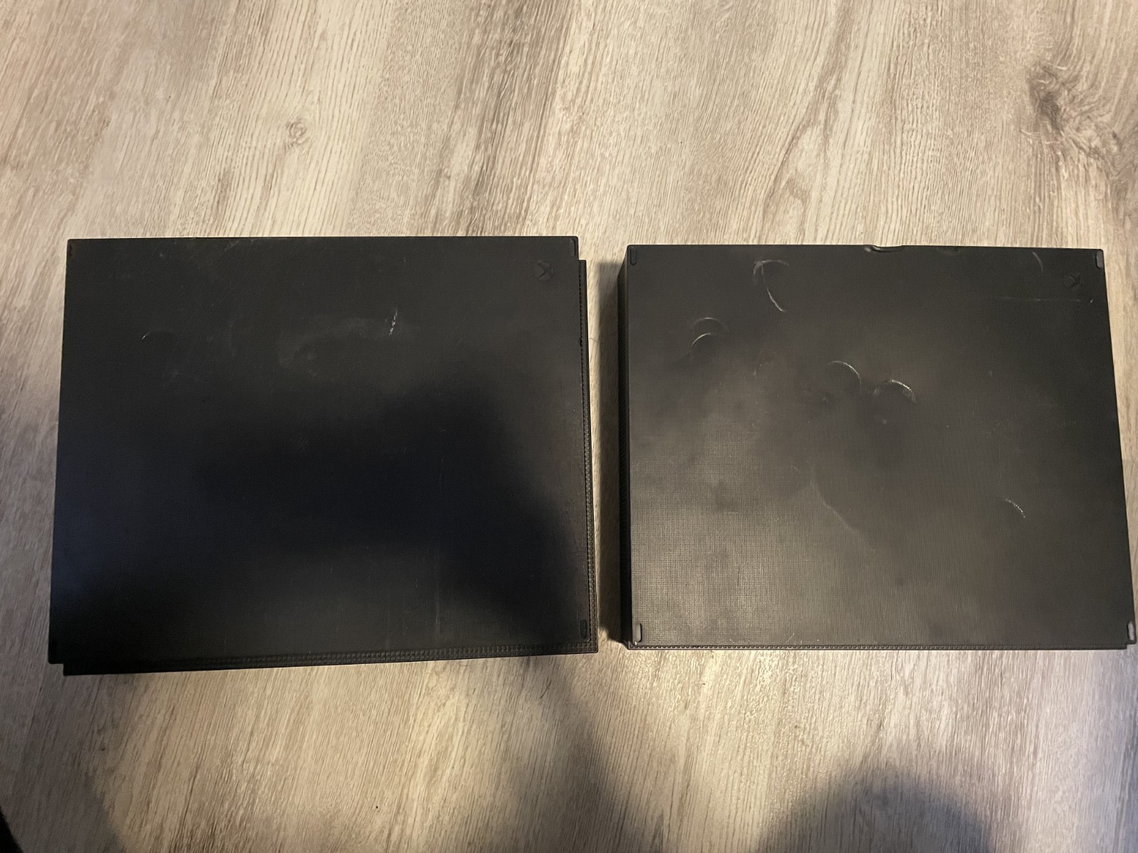 Two (2) Microsoft Xbox One X 1TB consoles for parts *read*