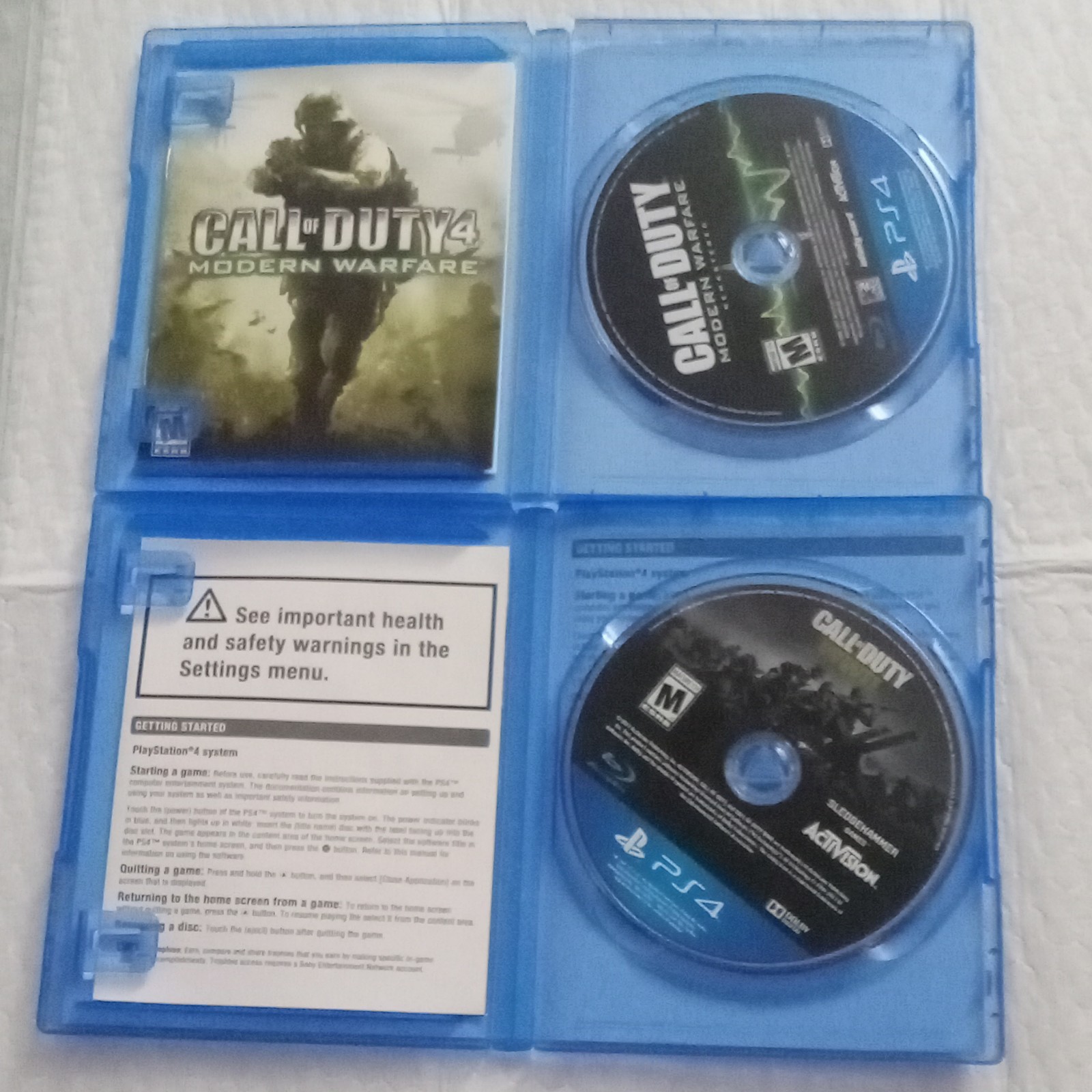 Sony PlayStation 4 Slim Green Camo Console HDMI Bundle w/ Call of Duty Games