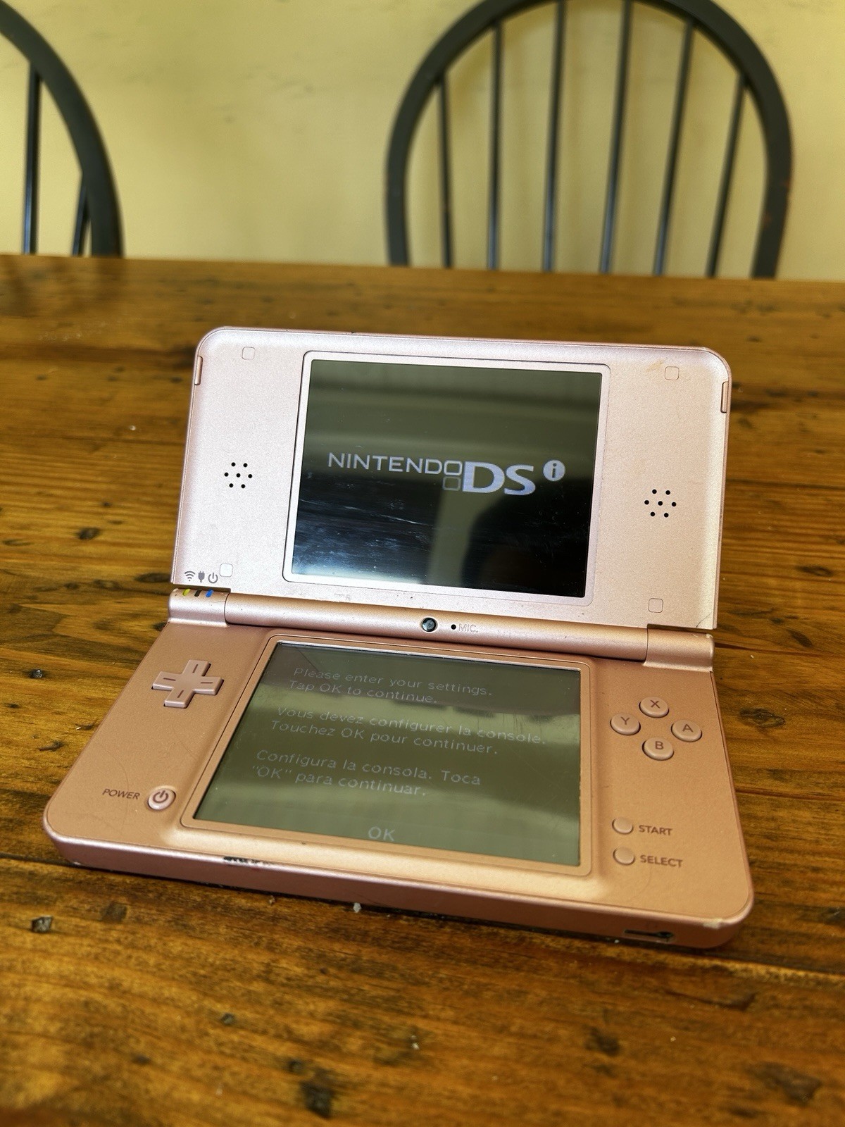 Nintendo DSi XL Metallic Rose Handheld System (No charger, pen or accessories)