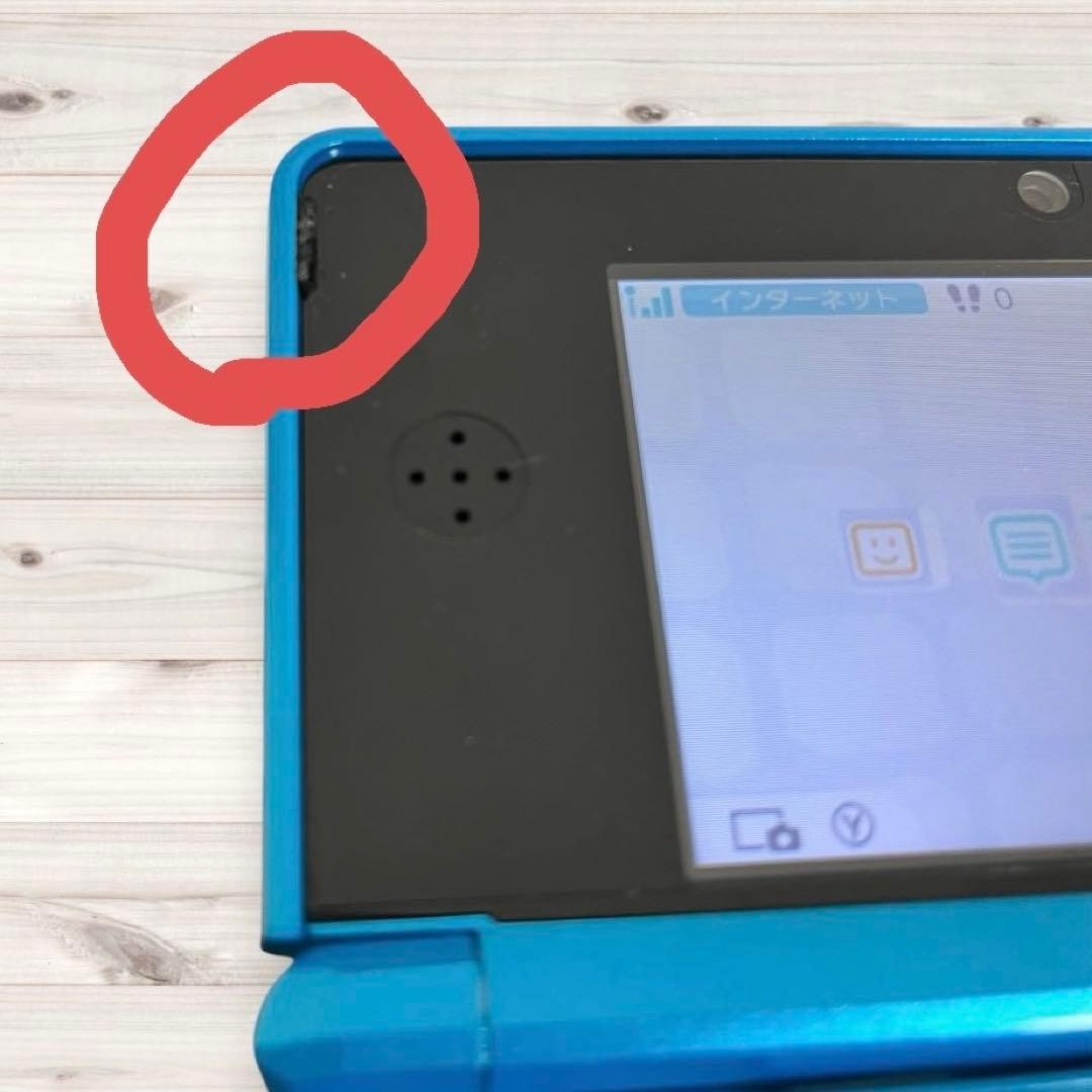 Nintendo 3DS console (Light Blue/Aqua Blue) with charger and stylus included.