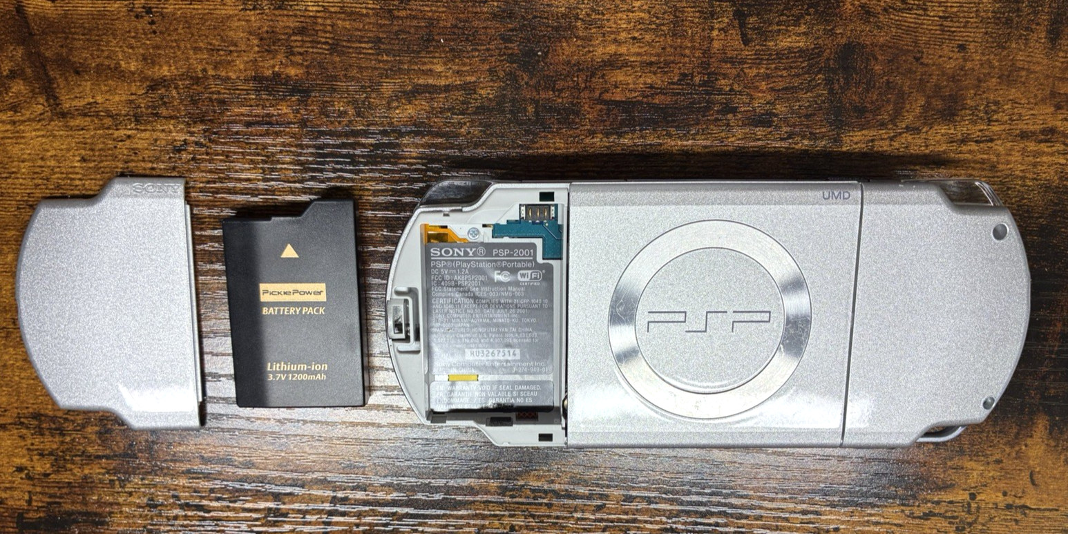 Sony PSP-2001 Silver Console NEW-Barely Used w/New Battery/Charger + 3 UMDs