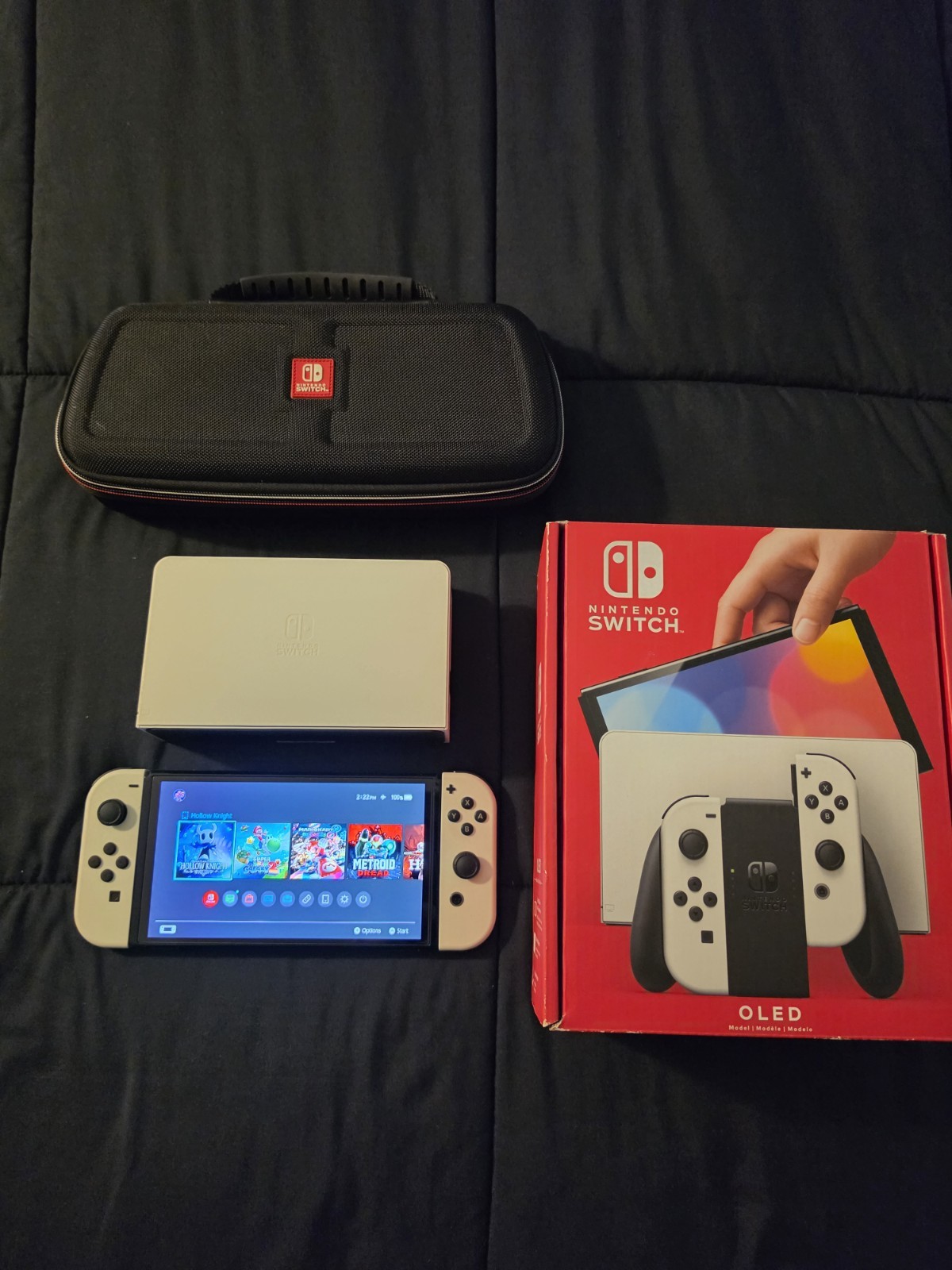Nintendo Switch OLED Model – 64GB – White with case and SD card.