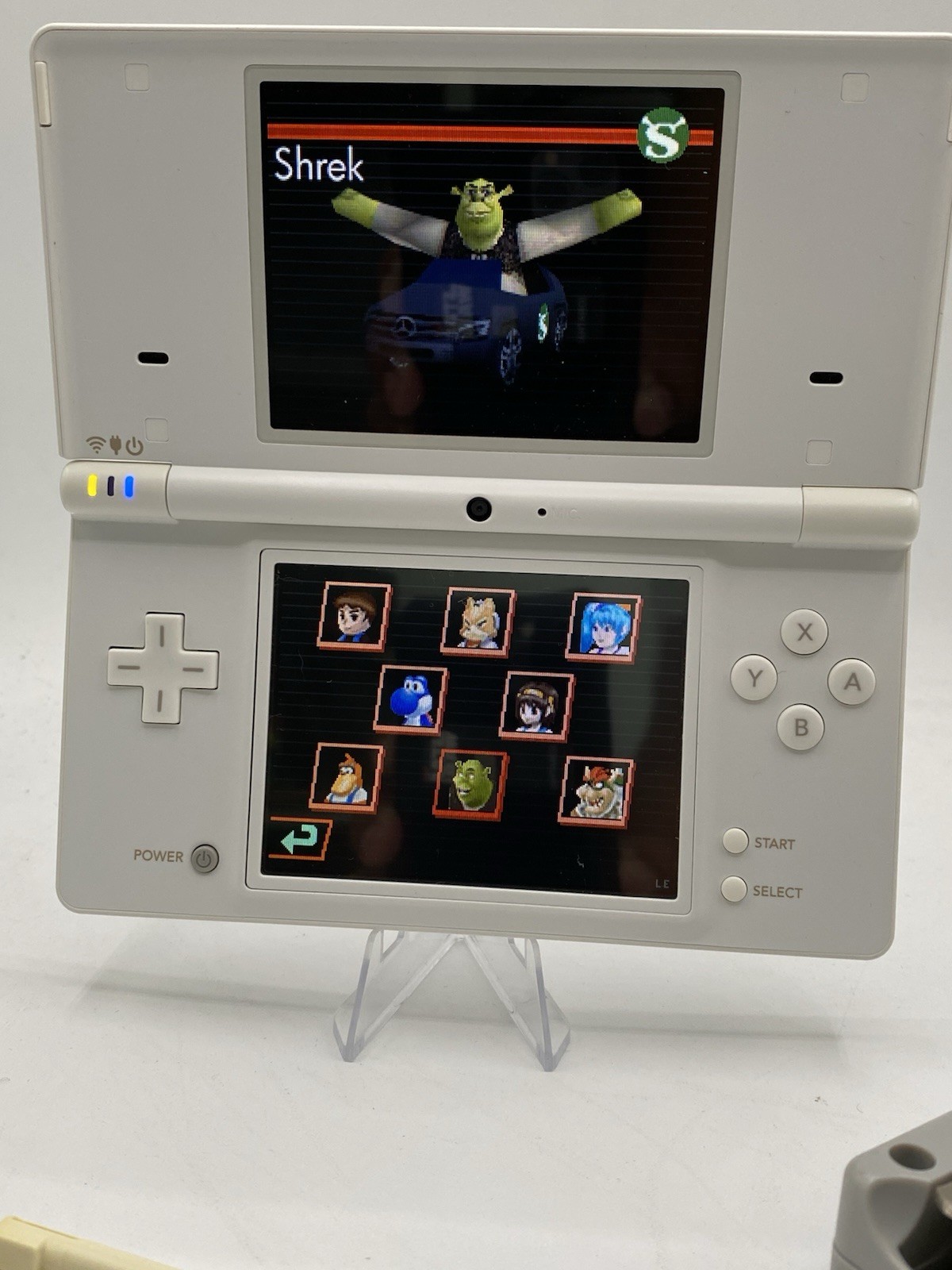 Nintendo DSi White – Includes Preloaded Library (Large Collection)