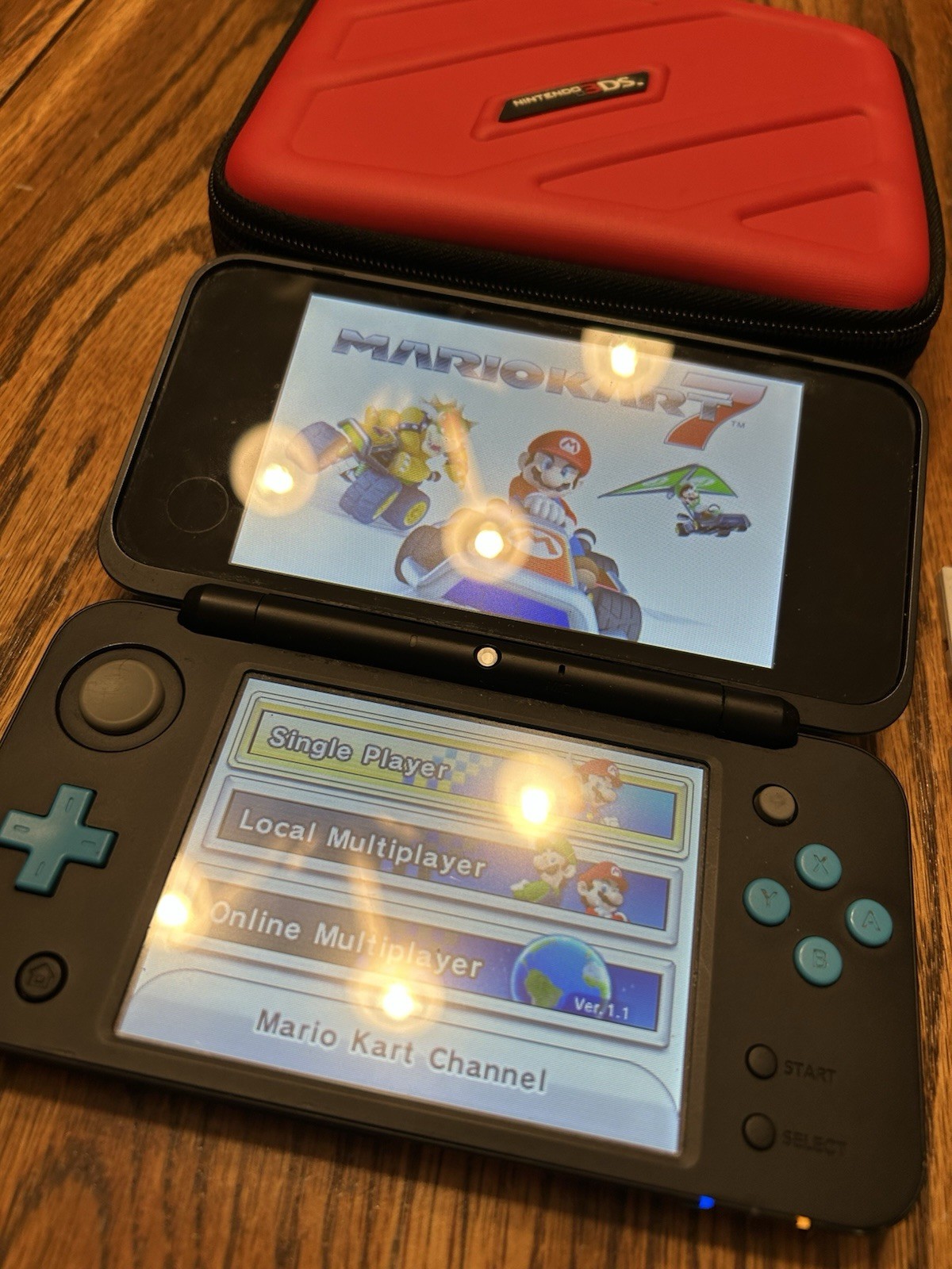 Nintendo 2DS XL Handheld Console w Mario Kart 7 Black/Turquoise Kirby Smash Case