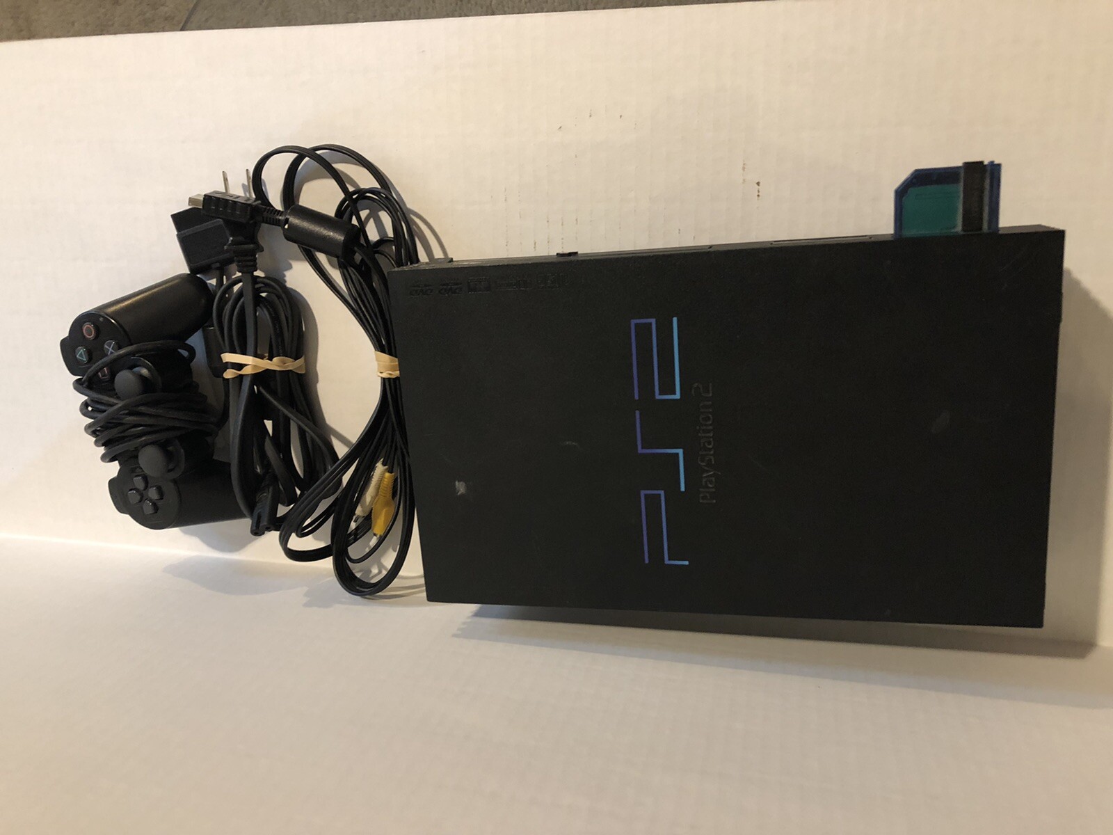 Sony PlayStation 2 w Memory Card & 9 Games. Used Good Condition
