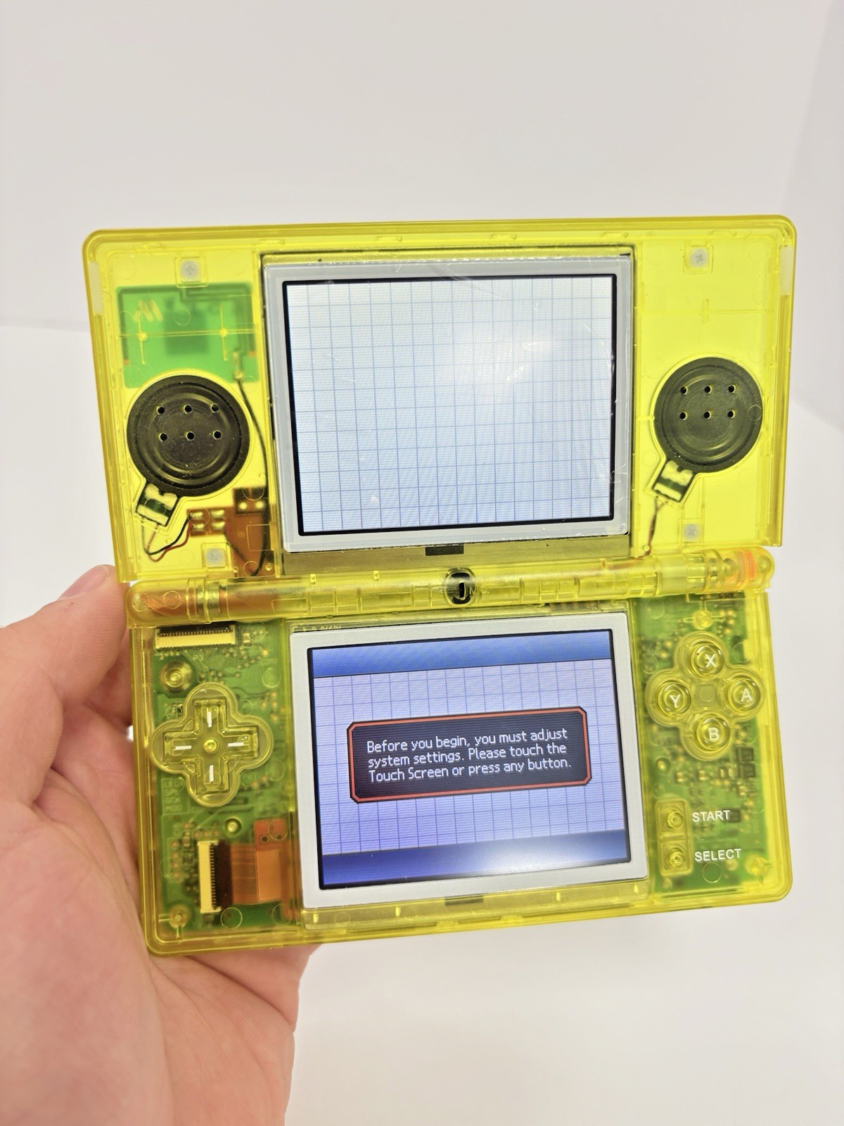 Refurbished Nintendo DS Lite – Transparent Yellow – New Shell