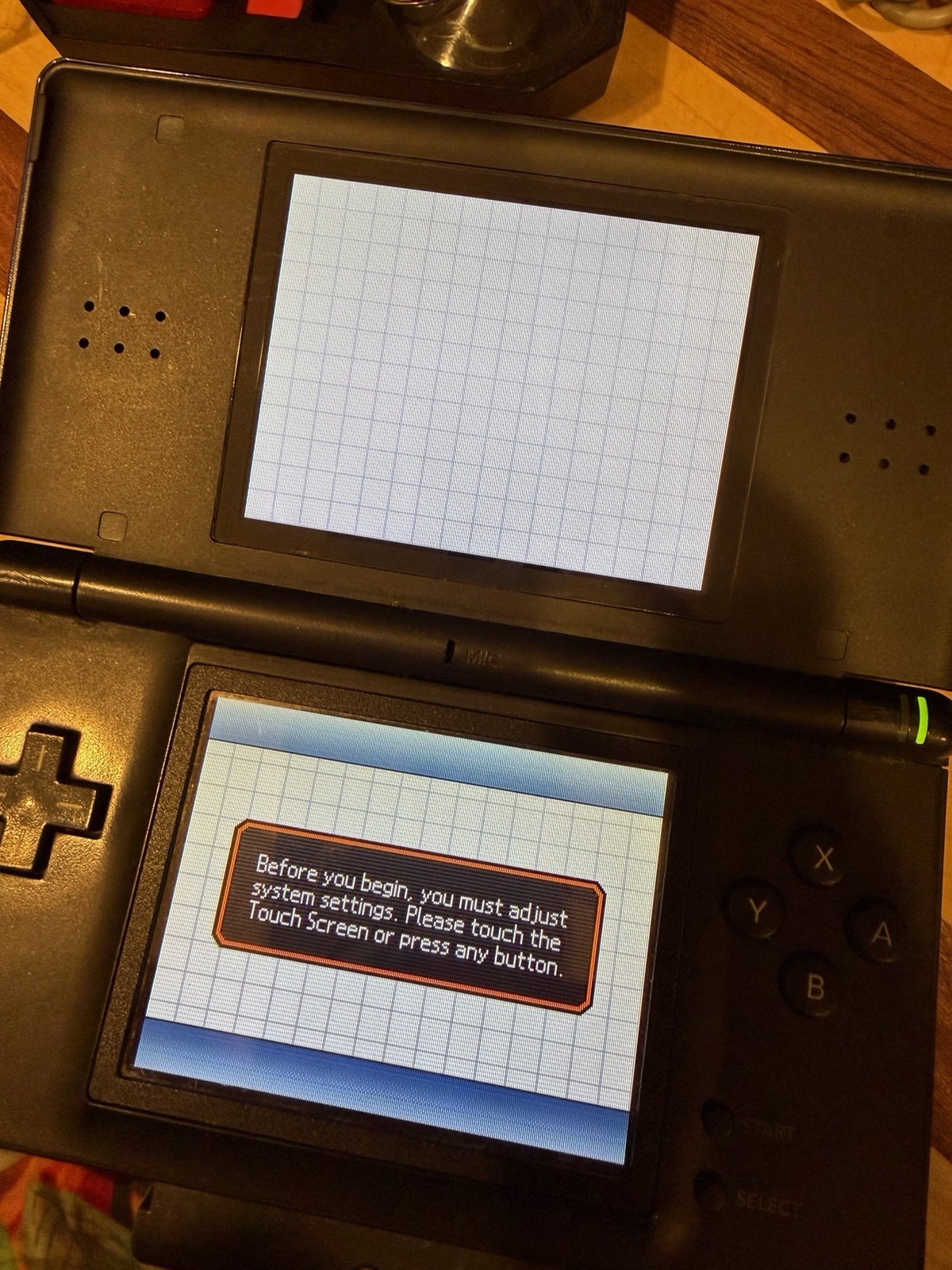 Nintendo DS Lite Handheld System Blue/Black w/ Charger (missing stylus) & Game